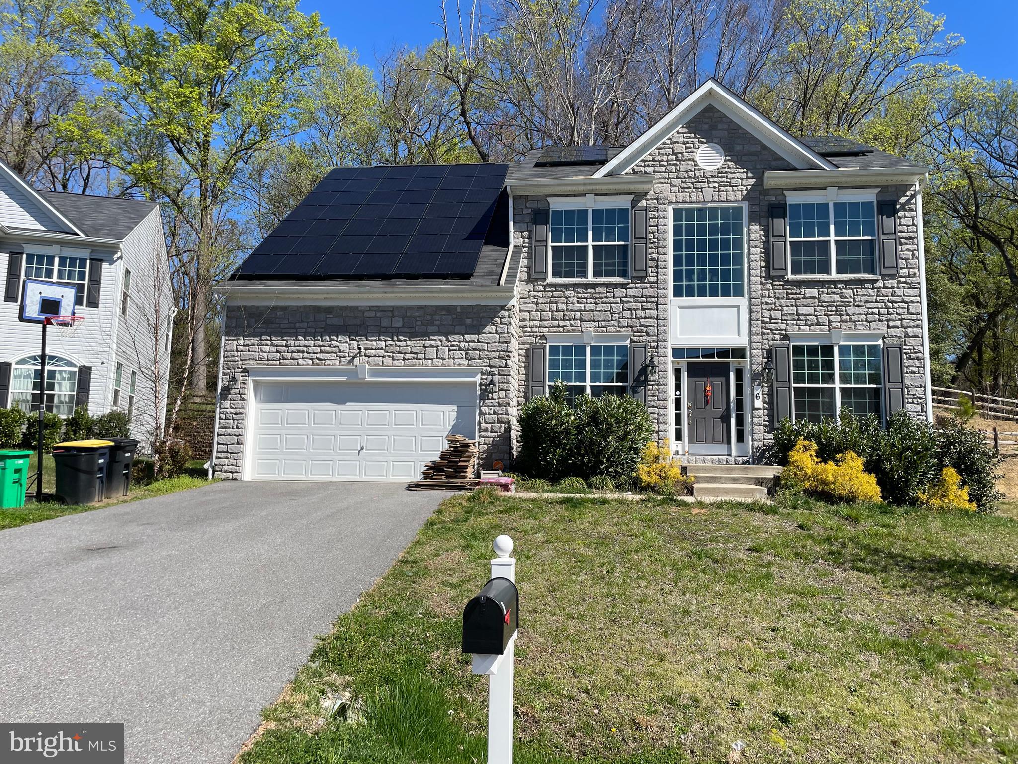 BIG PRICE DROP! Check out this stunning 2020 Caruso Oxford home offering 3,824 sq ft of stylish, modern living! Stone front + 2-car garage for great curb appeal. Inside: an open layout with luxury vinyl plank floors, a bright kitchen with stainless gas appliances & huge granite island perfect for cooking & gathering. Relax by the cozy gas fireplace or enjoy movie nights & workouts in the finished basement with theater, gym & rec space. Assumable solar system for energy savings! Minutes to National Harbor, Tanger Outlets & major highways.