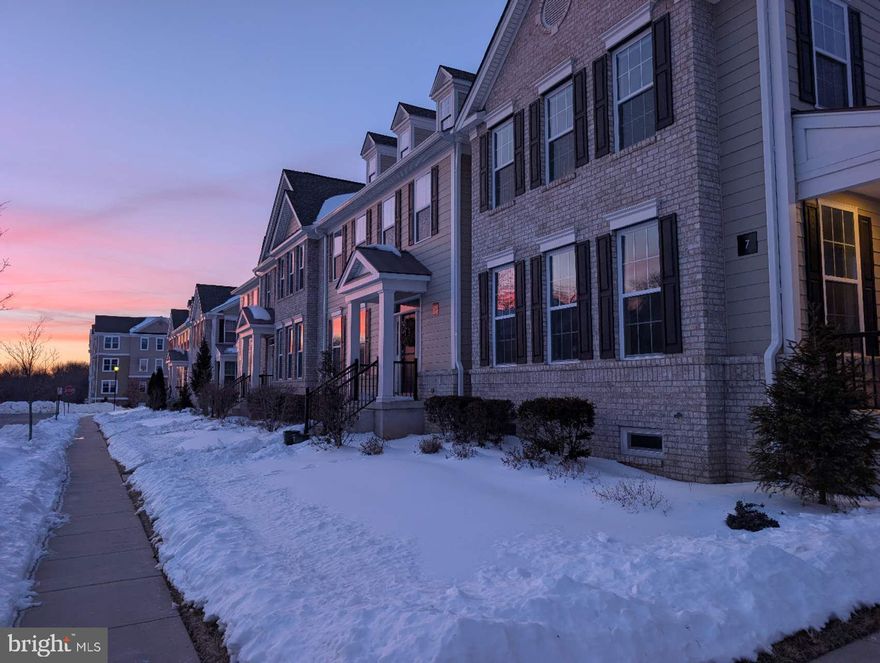 Almost-new east-facing end-unit townhouse built by Toll Brothers in 2019, ideally located in the heart of West Windsor and within walking distance to the Princeton Junction Train Station. Convenient access to downtown Princeton, top-rated WWP schools, parks, and major highways.

The main level features an open-concept layout with 9-foot ceilings, premium finishes, and abundant natural light. The chef’s kitchen includes a large center island and flows seamlessly into the family room with fireplace, creating an ideal space for both daily living and entertaining. A bright breakfast area and thoughtfully designed mudroom add comfort and function.

Upstairs, the spacious primary suite offers a private retreat with a spa-style bath and walk-in closet. Two additional bedrooms share a well-appointed hall bath, while a generous loft with skylight and walk-in closet provides flexible space for a gym, home office, study, or media room.

The finished lower level includes a large recreation room and full bath, and can also serve as a private office or guest suite. 

Offering 2,686 sq ft of above-ground living space, plus a two-car garage and ample storage, this home delivers modern design, functional layout, and an exceptional location in one of West Windsor’s most desirable communities.