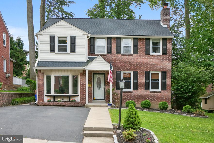 Wow!!!  This stunning brick Colonial in Pilgrim Gardens will not disappoint!!!  As you enter the home you will immediately be welcomed by the beautiful living room with hardwood flooring, brick fireplace, recessed lighting, and a curved entrance into a spacious dining room with chair rail and hardwood flooring.  The kitchen features white cabinetry, stainless steel appliances, tile backsplash, and a breakfast bar that could easily seat three.   There is a spacious bonus room off the kitchen that is a bright and sunny space with tons of natural light flowing from the bay window!  This area could be perfect as a second living room, office, or play area.  A tiled powder room completes this level.  Upstairs features a large master suite with two closets and a master bath with stall shower.  Three spacious bedrooms with ample closet space and a cool retro hall bath are also located on this floor.  Hardwood flooring flows throughout all bedrooms.  The basement has been been finished and provides the perfect hang-out spot with an entertaining space, bar, reclaimed wood accent wall, and a second powder room!!!  There's plenty of space to enjoy the outdoors in the fenced in backyard with a large patio.  New roof, new gutters, new attic insulation, new furnace, and new furnace chimney liner - all with a transferable warranty to the next owner!!!  Easy Access to local restaurants and bars, 476, and 95.  Don't wait to tour this home!