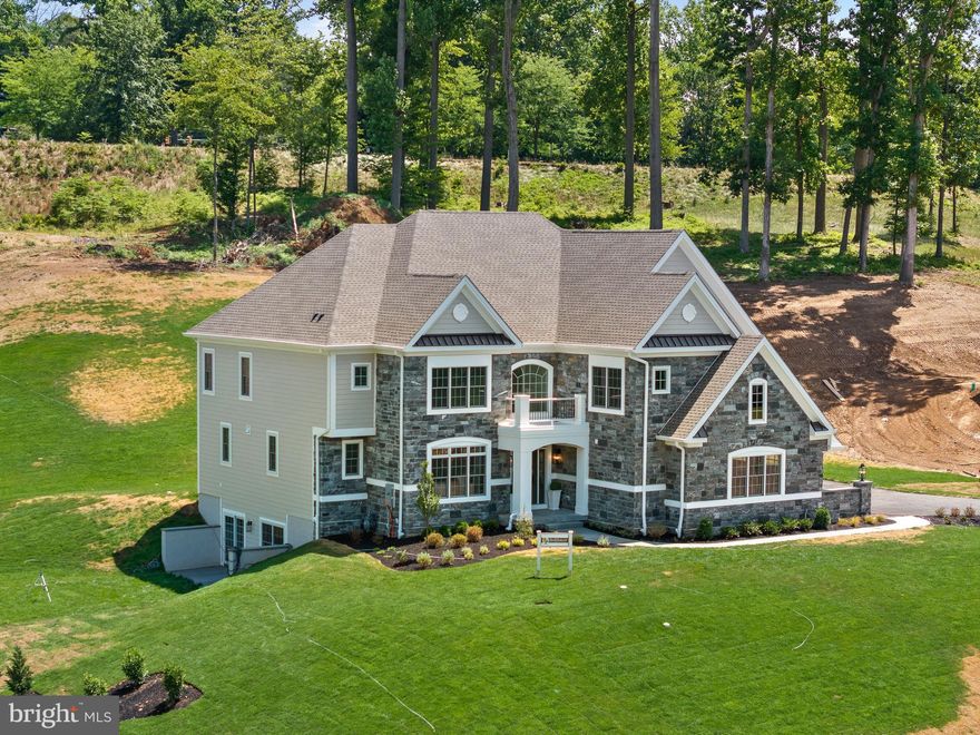 Welcome to the just completed Bellflower Model Home available for Summer 2024 Delivery!   Village of Four Seasons offers an Incredible Location, Large Home Sites, Well Designed Floor Plans, and Desired Included Features plus this home has added Designer Selections!  An enclave of only 38 homes in a fabulous location in close proximity to the Philadelphia Airport, major routes, fine dining, and shopping, and neighboring the scenic Springton Reservoir!   The Bellflower Model offers smart architecture for easy entertaining and everyday living with included appointments such as Stone & James Hardie Sided exterior elevation, Pella windows, rich interior moldings, wide engineered hardwood floors, side sweeping staircase, open balusters & railing, solid interior doors, insulated interior walls, and the list goes on!   Step into our Foyer and be welcomed with beautiful windows and natural light that allow the gorgeous outside landscape to follow you inside!   Once inside, the Dining Room will delight you with its sophisticated tray ceiling and adjoining Butler's Pantry with glass front cabinets, ready to be the serving station for your next get together!  The Gourmet Cook's Dream Kitchen will WOW you with an expansive 10’ Arched Center Island, Tall Painted Cabinets with Crown Molding to the Ceiling, Undercabinet LED Lighting, Quartz Countertops & rich Tile Backsplash, equipped with the Luxury Cafe Series Stainless Steel Appliance Package, including Double Ovens with the top French Door Wall Oven, Built in 5/1 Microwave Oven, Stainless Steel Dishwasher, 5 Burner Gas Cooktop with Griddle, Stainless Steel Hood,  and French Door Refrigerator Freezer all overlooking the cozy Breakfast Area complimented with a rear glass wall.   On game day, your friends & family will enjoy watching their favorite team in the adjoining Two-Story Family Room, with a handsome fireplace and window wall.   The First Floor also features Bedroom 5 or Den with a large Walk-In Closet and a Full Bathroom.  In addition, there is a convenient Mudroom Hall giving access to a Covered Outside Entrance, Three Car Garage, Coat Closet, and an Additional Walk-In Closet sized for a possible Future Elevator.    The Second Floor offers a great design with a dramatic Balcony leading to the luxurious Owner’s Suite with a Bay Window looking onto the Rear Grounds, Volume Tray Ceiling, Dual Walk-In Closets, and a Spa Bathroom Retreat with Designer Tile, a Free-Standing Soaking Tub, Spacious Shower with Frameless Shower Door and separate Wall Vanities with adjoining Tower Cabinets.  Three additional generously sized Bedrooms, Two Full Bathrooms, and a conveniently located Laundry Room outfitted with Tall Cabinets and a Utility Sink with Base Cabinet complete this level!   Please note the Total Square Footage includes over 1,300 square feet of Lower-Level Finished Space with an expansive Flex Area, Bedroom or Den, Full Bathroom with Shower, Storage Closets, Daylight Windows, and Walk-Out Entrance onto a Garden Patio overlooking a sodded yard with beautiful landscaping.  We are Open by Appointment only, so please call for details and to schedule your tour!   Photos are of this home and another model home and may show options.