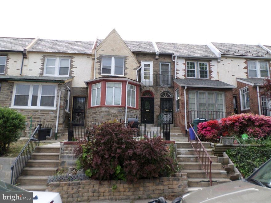 A Truly Exceptional Home !  Located Just Steps From Fisher Park's Recreation & Scenic Trails.  Classic Stone & Stucco Fa ade.  Deep Front Patio And Garden Are Perfect For All Seasons Enjoyment.  Foyer Entrance.  Living Room With Stone Fireplace Mantle, Recessed Lights, Sconces, Classic Hardwood Staircase, And Unique Sitting Room.  Formal Dining Room Features A Chandelier Light Fixture And A Handy Coat Closet.  Gourmet Kitchen With Tile Floor & Backsplash, Extra Hardwood Cabinets, And Gas Cooking.  Double French Doors Lead To A Balcony Overlooking The Rear.  Second Floor Master Bedroom Features Three Closets And Rare Front Balcony.  Two Additional Generous Sized Bedrooms With Great Closet Space.  Marvel At The Newer Designer Bathroom With Upscale Fixtures And Gorgeous Tilework.  Full Basement With Durable Tile Floor, A Full Three Piece Bathroom, And Hidden Laundry Area.  Attached Garage With Newly Cemented Walls And Lightweight Insulated Aluminum Door.  The Refinished Hardwood Throughout This Home Is Simply Astounding.  Front & Rear Steel Doors.  Awnings On Property Rear.  Appliances & Three Ceiling Fans Included.  Come Out...Take A Look.  You Will Love This Street !