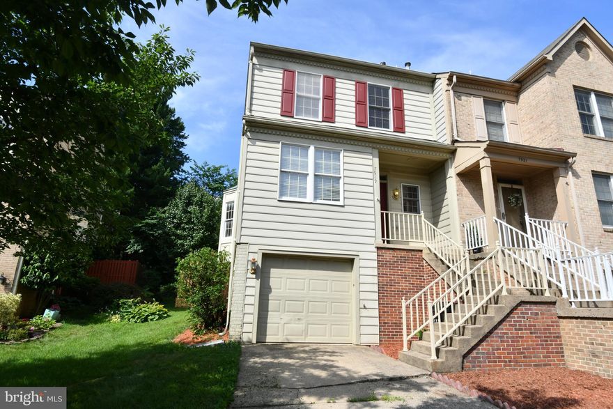 Wow!  Huge, four finished level, brick front garage townhome!  End unit w/ oversized, fenced backyard - Two master suites, loft/bedroom 3 & den w/ closet/bedroom 4 downstairs - Gleaming main level hardwoods - Updated kitchen w/ ceramic flooring, Corian counters, upgraded appliances & custom cabinetry  - Excellent location & fantastic HOA amenities!