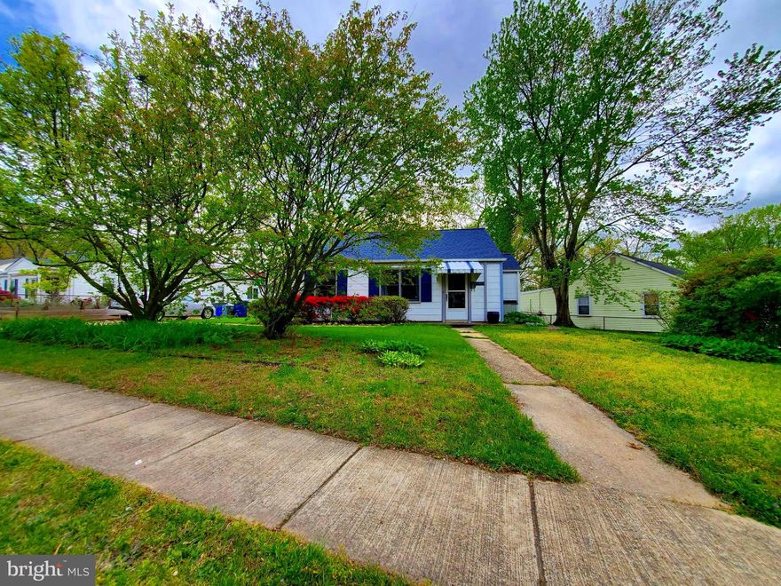 Conveniently located rancher with a beautiful level lot just .4 miles to the metro and .1 mile to the bus stop.  Modern kitchen with lots of storage space and light. Small den, large closets, and updated roofing.  Come take a look!