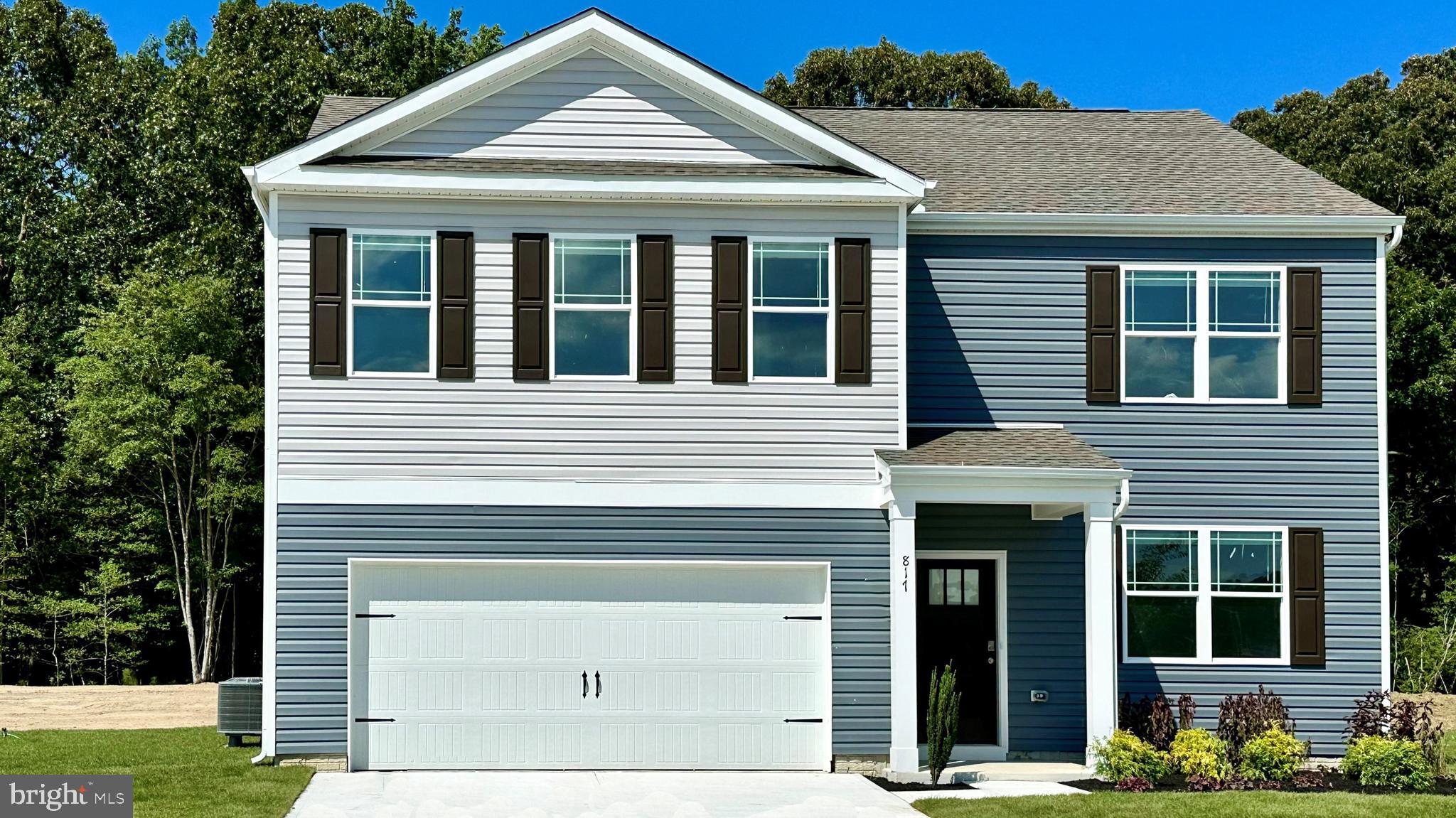 Experience a new home in Salisbury, MD at 1141 Wintermead Loop located in Heritage Trace. The Hayden, a 2,511 square foot unique two-story home, offers five bedrooms, one located on the first floor, three full bathrooms, a flex room, a loft, and a two-car garage.
The home’s welcoming foyer offers two coat closets and creates the perfect space to greet your guests. In the front of the home, the flex room with an abundance of natural light could be used as a home office or a den.
You enter the well-designed kitchen that features a generous amount of white cabinetry and granite counter space past the foyer, a corner pantry, an island with a sink and additional room for seating. The kitchen has an eat-in dining space that is open to the spacious great room. A sizeable secondary bedroom and a full bathroom are located down the hall from the great room.
Upstairs, the owner’s suite boasts an ample bedroom, a generous walk-in closet and an oversized owner’s bathroom with a linen closet, toilet closet and walk-in shower. The three additional large bedrooms and expansive open loft allow for everyone to have their own space. The second floor also features a roomy secondary bathroom with double vanity and linen closet, a conveniently located laundry room, and an additional hall linen closet.
The home includes white window treatments and the innovative America’s Smart-Home® package that will give you complete peace of mind.
Pictures, artist renderings, photographs, colors, features, and sizes are for illustration purposes only and will vary from the homes as built. Image representative of plan only and may vary as built. Images are of model home and include custom design features that may not be available in other homes. Furnishings and decorative items not included with home purchase.