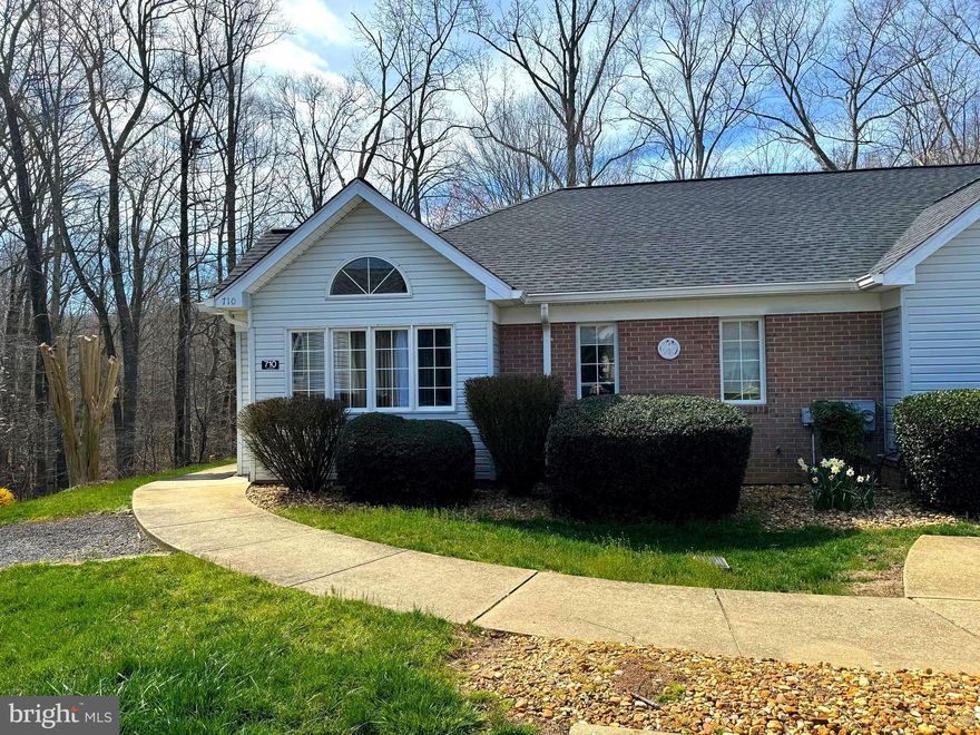 Two level End unit Condo, Townhome style, located in Central Calvert County!!  Conveniently located to  County Government Offices, Hospital and Medical Offices, as well as shopping and many restaurants!! This lovely, well maintained home has three oversized bedrooms and 3 full bathrooms!!  Two bedrooms are located on the main level and downstairs has its own living quarters with a separate bedroom, full bath and fully equipped kitchen!  Perfect for an in-law suite or visitors! Grab your coffee or tea and enjoy the peaceful sounds of nature on the deck overlooking the oversized private backyard!   Condo Fee includes lawn maintenance, trash pick-up and cable tv!!!   No Pets (NO EXCEPTIONS)!!! Landlord requires a 650 Credit Score.  No smoking permitted in home at any time!