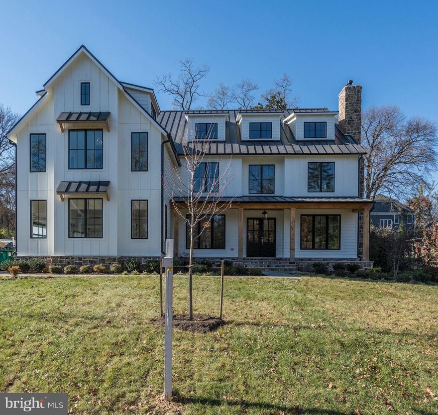 Just completed!  New modern farmhouse with over 8500 SF of living space.   Amazing high end finishes complete this house. Level rectangular lot on quiet street.