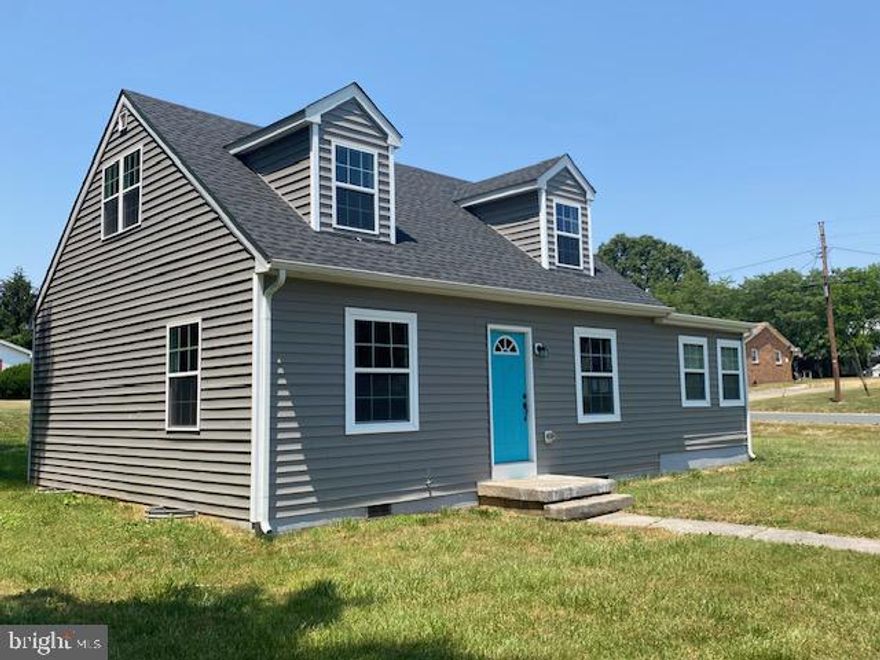 Cape Cod style home located just outside the heart of Chestertown! This home has updates throughout. Enter the front door & be greeted by an open floor plan. The spacious living room to your right and open dining area with modern chandelier. The island kitchen is finished with granite counters, stylish pendant lighting & shaker style cabinetry trimmed with crown. The adjacent mudroom is conveniently closest to the side driveway with laundry hookups. Just down the hall is the powder room & primary suite. The primary bedroom is carpeted with a walk-in closet. The primary bath has a tub shower combination & double vanity sink. Upstairs you find 2 additional bedrooms with a full 2nd bath finished with a tile style tub surround. Enjoy country living on the outskirts of town with 1/2 an acre of land & in town convenience of public water & sewer service.