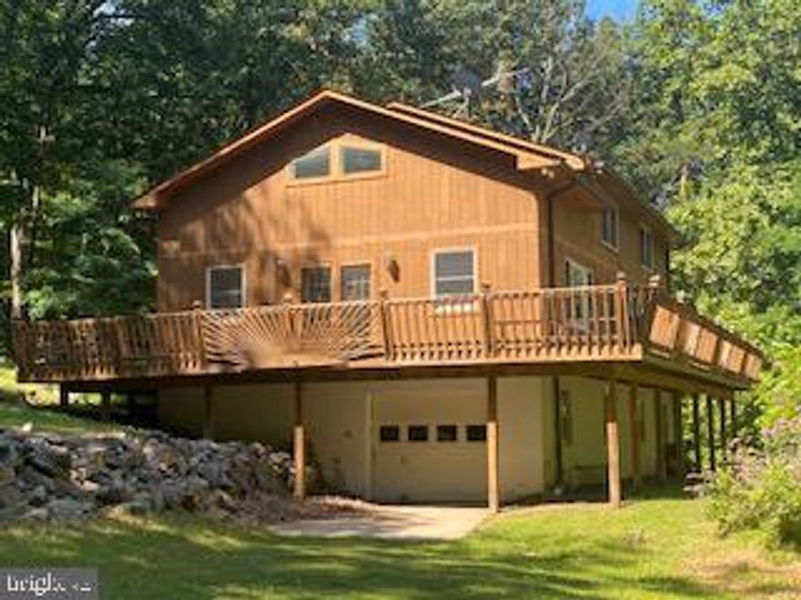 Opportunity knocks!  Turn this beautiful mountain home into your own! 2400+ sqft, 3BD, 2BA on 5.6 acres.  The property is located in the Blue Ridge Mountains and backs up to the Appalachian Trail.  15+ miles to downtown Leesburg, 20 miles to Winchester, and less than 2 miles to the Shenandoah River.  A few other excellent points of interest are the Stoneleigh Golf and Country Club,  several Wineries, and the Bears Den Overlook.  Real Estate Agent Owned. Please contact me anytime.