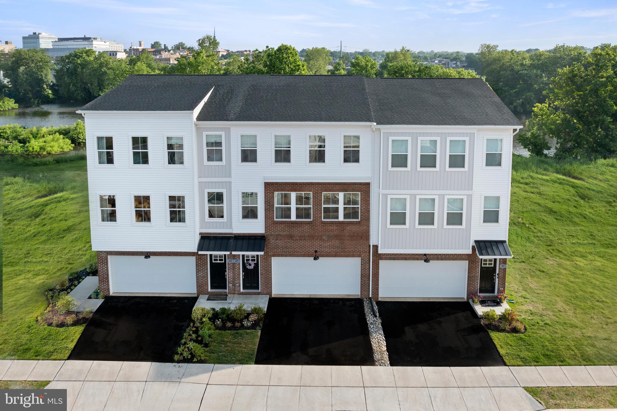 SET UP A VISIT TODAY SO YOU DO NOT MISS OUT ON LOCKING IN A SPECIAL FINANCING 2/1 BUYDOWN WITH A FIRST YEAR RATE OF 2.75%! QUALIFICATIONS DO APPLY.
FASTEST SELLING COMMUNITY IN MONTGOMERY COUNTY! The BEST Priced Pinehurst Floor Plan at River Pointe is available! Enjoy this spacious and bright Pinehurst floorplan! Embrace waterfront living at River Pointe, an exciting new community with walkability, convenience, luxury and low-maintenance living, all in the highly rated Upper Merion School District. This Pinehurst floorplan is full of style and function. The versatile entry level offers a finished flex room with walk-out that can be utilized as a home office, media room, playroom, or home gym - this space will cater to your needs! On the impressive main level, you will immediately notice the open and airy feeling. The kitchen features an abundance of 42" cabinets with soft-close hinges topped with quartz countertops including a large island. Extended off the kitchen is a composite deck included in the price of this home! Back inside, there is a dining room conveniently positioned between the kitchen and large great room. This creates a great atmosphere for everyday living and entertaining on special occasions. Upstairs, you will find laundry at the top of the steps for convenience with the INCLUDED washer and dryer. The primary bedroom is privately located in the back of the home. The primary bedroom offers a walk-in closet and en suite outfitted with dual sinks and a tastefully designed subway tiled shower. On the other side of this level are two secondary bedrooms that could easily be used as a home office or home gym. A hall bath is nearby to ensure comfort for all residents. Come see what all of the hype is about! River Pointe will be a wonderful community for so many happy homeowners to come! Schedule your appointment today!
*Prices, dimensions and features may vary and are subject to change. Photos are for illustrative purposes only. Features vary by homesite- see sales team for details. Taxes to be assessed after settlement. The agent's client must acknowledge on their first interaction with Lennar that they are being represented by a Realtor, and the Realtor must accompany their client on their first visit. Please visit the model home located at 13 Karpovich Aly for appointments and open houses.*