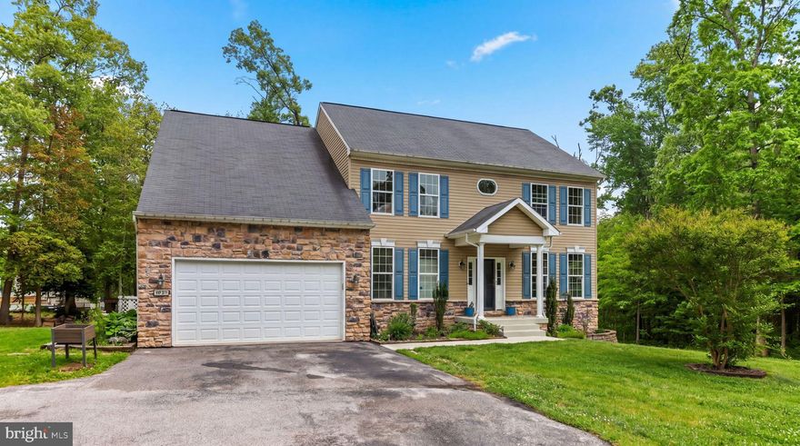 If you're looking for lots of personal space and water privileges in Anne Arundel County, look no further. This 7 bedroom, 4.5 bathroom home in the sought after Chelsea Beach community, is situated on 1.07 acres, complete with a chicken coop and is ready for you to call it home. 
The first floor layout flows beautifully with plenty of flex space to suite your needs- playroom, homework room, home office or 2? The options are endless. The gourmet kitchen features granite counters, stainless steel appliances, and an island with seating, plus space for a kitchen table.  Off the kitchen are separate dining and living rooms, a mudroom leading to the 2 car garage, and access to the expansive deck and backyard. There's even a leveled out and rubber mulched space, ready for a playground.
Upstairs each of the 5 bedrooms are spacious and 3 full bathrooms give everyone plenty of space to breathe. Enjoy your own private oasis, because the large primary suite includes a 2 sided walk in closet, a soaking tub, stand alone shower, 2 sinks, and a separate toilet room. There are laundry hookups on each level, so pick your favorite spot or have multiple! 
But wait there's more! The finished basement includes 2 bedrooms and full bathroom, with plenty of extra space to relax, play, and/or exercise.  And your Chelsea Beach neighborhood has boat ramps, a fishing hole, playground, and nature trail! Association fee is optional.
Book your showing today and see all this beautiful and well maintained home has to offer.