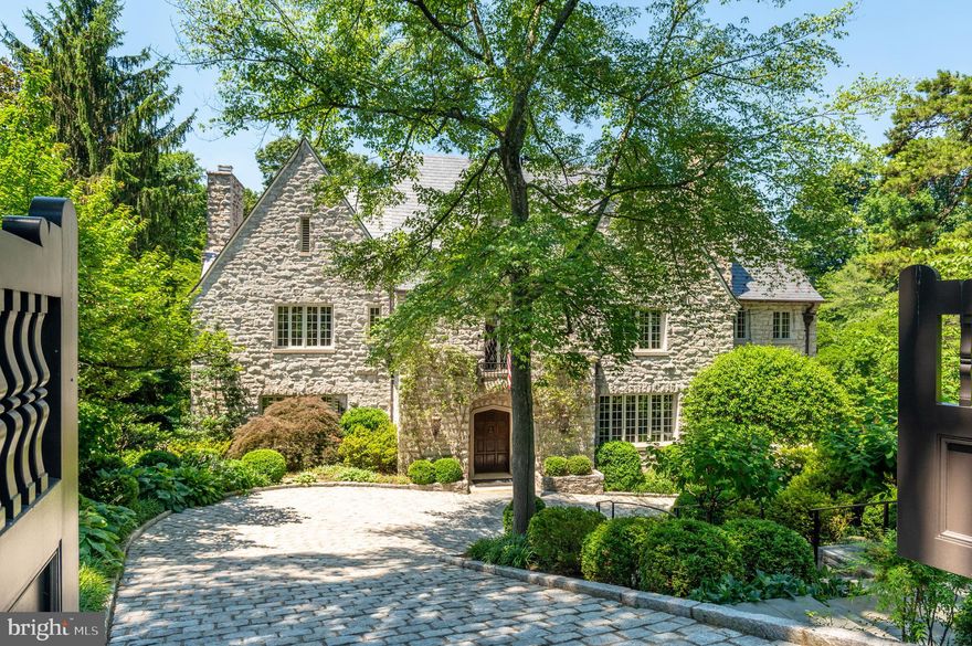 Former US Senator's estate for sale! 2860 Woodland Dr NW is a stunning 1927 stone manor that has been expertly reconstructed and meticulously refined into an unforgettable residence that dovetails comforting charm and sharp sophistication. The extensive renovation delivered a vibrant renewal of the interior spaces while also adding subtle touches of modernity. BarnseVanze Architects perfectly crafted a home that is prepared to welcome generations to come. This estate is comprised of 6 BR, 5 BA, and 2 HB throughout 10,350 Total SF and is nestled on a combination of 3 lots that total nearly 1 acre. The home is surrounded by extensive hardscaping and landscaped grounds. Layered gardens, a sizable 41x18' Swimming Pool with a Pool House, and a Croquet Court add to the wonder of this incredible property. There are two Gated Entrances that pour into a Circular Driveway and an attached 2-Car Garage and space for an additional 10+ cars. The Foyer opens with 9'10" ceilings and incredible serene views of the rear terrace. The Living Room commands your attention with its handsome coffered ceiling and custom millwork. The formal Dining Room is flanked by stunning arched double doors. This Chef's Kitchen has been graciously outfitted to perfection. Surrounding the 9' marble topped center island is a beautifully designed space that includes a 6-burner Wolf range, ample pantry space, a dishwasher and dishwasher drawers, double sinks, a full-size refrigerator and refrigerator drawers, and many more enviable features. The Sunroom is a charming retreat that is dressed with stone and flushed with natural light. All of the stone floors in the home, including the Sunroom, are heated for added comfort.  The private Library has extraordinary character with its wall of built-ins, robust millwork, Fireplace, and Wet Bar. A private Elevator that gives access to all 4 floors and Powder Room complete this level.  The First Upper Level is a graceful collection of 5 private suites. The Primary Suite showcases abundant closet space, an elegant En-Suite Bath, a Dressing Area, and a Balcony with views of the grounds. The luxurious Primary Bath is comprised of a soaking tub, dual vanity, oversized shower, and a water closet. 2 secondary Bedrooms have private Baths and walk-in closets. The remaining 2 Bedrooms share a "Jack & Jill" style Bath. One of a kind in-town estate with unparalleled privacy!