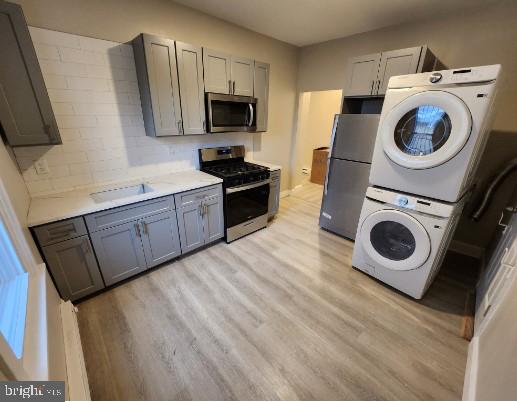 Welcome to this recently renovated 2 to 3 bedroom, 1 bath apartment in Germantown! This 2nd floor unit features built-in closets, in-unit washer and dryer, and a deck off of the kitchen for your own private outdoor space! The third room could be utilized as a 3rd bedroom or a large living room space. Don't miss out on this opportunity, schedule a showing today!