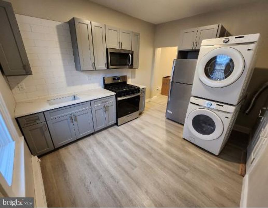 Welcome to this recently renovated 2 to 3 bedroom, 1 bath apartment in Germantown! This 2nd floor unit features built-in closets, in-unit washer and dryer, and a deck off of the kitchen for your own private outdoor space!  The third room could be utilized as a 3rd bedroom or a large living room space. Don't miss out on this opportunity, schedule a showing today!