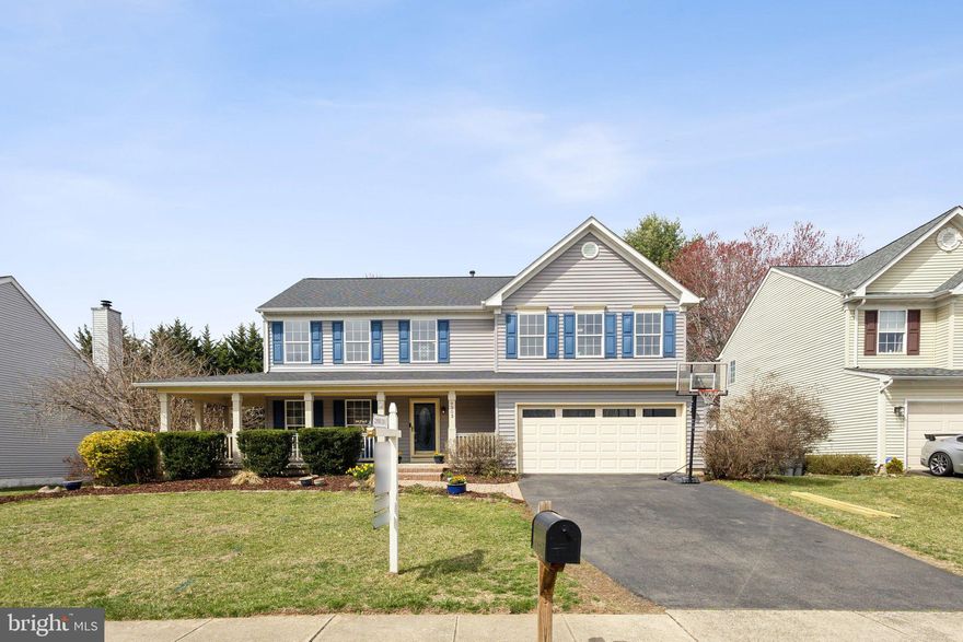 Welcome to this charming three-level home in the desirable Blooms Crossing neighborhood! With 4 bedrooms and 4 bathrooms and over 3,000sq feet of living space, this home is perfect for entertaining, offering an open floor plan, a screened-in back patio, a spacious fenced backyard, and a hidden pub in the basement. Start your day with coffee on the inviting wraparound front porch. The main level features a two-story foyer, stunning hardwood floors, and an open kitchen that seamlessly connects to the family room, complete with a wood-burning fireplace and custom built-ins. This level also includes a laundry room and a powder room for added convenience.
Upstairs, the primary suite impresses with cathedral ceilings and an en-suite bathroom featuring a double vanity, soaking tub, and separate shower. Three additional spacious bedrooms and a hall bath complete the upper level. The lower level is built for entertainment, offering a recreation room, a full bath, and a secret pub for hosting guests. Ideally located just 2 miles from the VRE with easy access to major highways, this home offers a convenient commute to Washington, D.C., and surrounding areas. Recent Updates Include Roof/Siding/Gutters 2023, HVAC 2024, Screened Patio 2018, Hardwood Floors on the main level, New Carpet in Family Room.