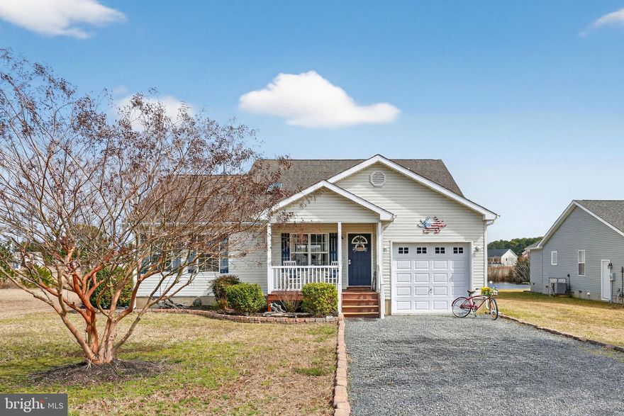 Golf course living in the sought-after Captain’s Cove Golf & Yacht Club! This charming coastal cottage overlooks the pond and the 9th hole, offering peaceful water, golf course, and wildlife views from the backyard, deck, and screened porch. The bright main living area features vaulted cathedral ceilings, skylights, and luxury vinyl plank flooring throughout the first floor. The spacious living room flows into the dining area and kitchen with all appliances included, creating a comfortable space for everyday living or entertaining. Sliding glass doors lead to the screened porch and deck where you can relax and enjoy the tranquil pond and golf course setting. The desirable first-floor primary suite features vaulted ceilings, a walk-in closet, and an ensuite bath with Jacuzzi soaking tub and walk-in shower. Upstairs, two additional bedrooms share a full bath and both enjoy beautiful views of the golf course and pond. A partially finished bonus room above the garage offers flexible space ideal for a hobby room, office, studio, or additional storage. The home also includes a large laundry/mudroom and a one-car garage. Many furnishings convey with some exclusions.  New HVAC system (2025)! Located in the amenity-rich Captain’s Cove Golf & Yacht Club community featuring a marina, boat ramp, fishing pier, golf course, three pools, fitness center, clubhouse, waterfront restaurant, and more. Ideal as a primary home, vacation getaway, or investment property on Virginia’s Eastern Shore.