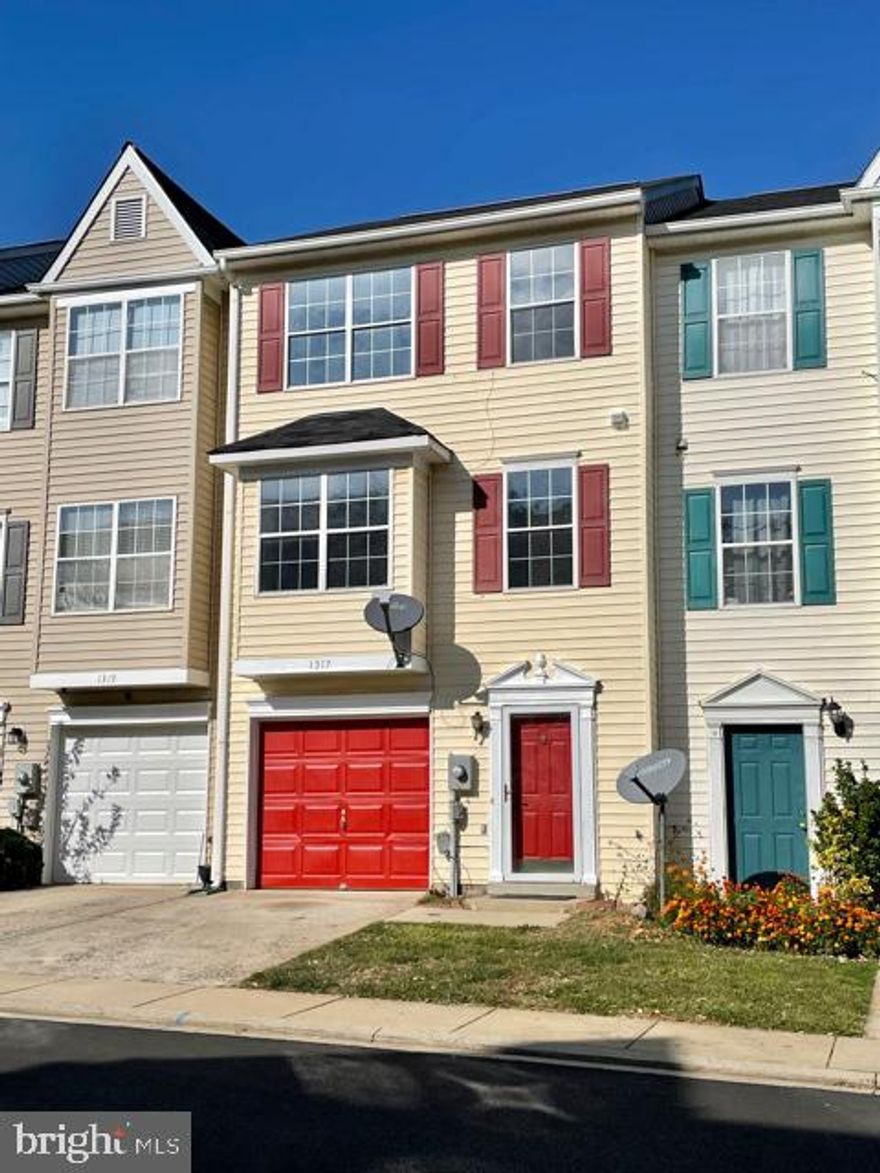 Welcome to this updated townhouse style condominium with new premium vinyl flooring on all 3 levels  and fresh paint throughout. Three fully finished above ground levels.  Lower level has area that could  become a 4th bedroom. Your very own private freshly painted garage w/ a new automatic garage door opener.  Second level is open concept with a cozy family room and access to the large back deck, a half bath and dining area located off of the kitchen that has granite counters and a center island.  3rd level is home to a large primary bedroom with double closets and tons of natural light.  2 secondary bedrooms and a large full bath w/ double vanity.  Close to retail, restaurants, schools and major commuter routes. The Condominium subdivision is not on the HUD approved condo list so this unit will not qualify for most types of lending/financing.  Investors welcome!  Say YES to this New Address!!