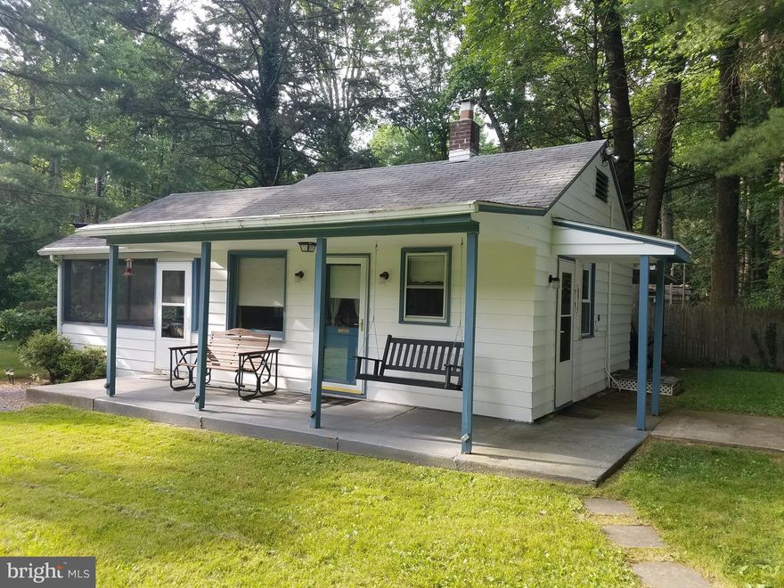 A RARE FIND ! THIS TWO BEDROOM CABIN SITS BACK OFF OLD RT 30 ON LITTLE OVER A 1/4 ACRE WITH NATURAL GAS. MAIN FEATURES INCLUDE: NEW WINDOWS, LARGE SCREENED IN SUN-PORCH, SMALL STREAM BESIDE PROPERTY, SHORT WALK OUT YOUR DOOR INTO STATE GAME LAND, CLOSE TO CALEDONIA STATE PARK, SWIMMING AND HIKING MUCH MORE. CALL FOR DETAILS!
