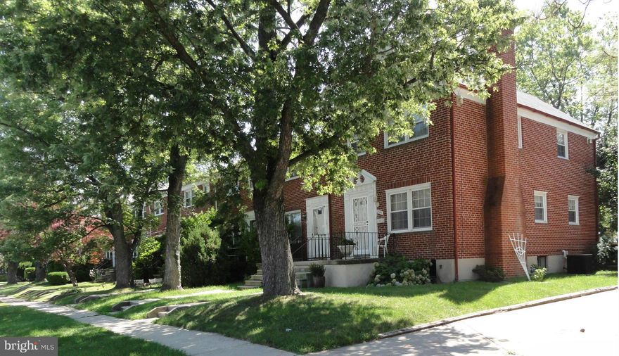 **REDUCED**End unit TH meticulously maintained by original owners & full of natural light*Interior offers large lr with wood-burning fp,formal dr,crown molding,2 sided ceramic tile breakfast bar & renovated kitchen w/granite counters,ceramic tile backslash & heated tile flooring*Home also offers hardwood thru-out,custom drapes,replacement windows & newer HVAC *Beautiful rear gardens and patio*