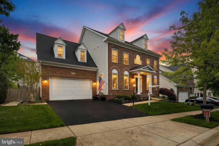 Welcome to 1557 Star Stella Drive in highly desirable Chapel Grove, Odenton luxury at its finest. This stately brick-front residence offers timeless architecture, commanding curb appeal, and beautifully maintained living space designed for both everyday comfort and upscale entertaining. Inside, the gracious layout features formal living and dining spaces, a private office, a spacious kitchen with center island, a sun-filled morning room, and an inviting family room. Upstairs, generously sized bedrooms include a serene primary retreat with a large en-suite bath and impressive walk-in closet. The finished lower level adds exceptional versatility with expansive recreation space, room for games, fitness, guests, or movie nights, plus additional full bath accommodations. Outside, enjoy a fully fenced backyard, paver patio, and outdoor spaces ideal for relaxing or entertaining. Meaningful recent improvements include a new architectural shingled roof with solar-powered attic ventilation fans, new 75-gallon water heater, new basement flooring, and all new carpet throughout. Set within one of Odenton’s most sought-after amenity-rich communities, this exceptional home offers luxury, lifestyle, and lasting value.
