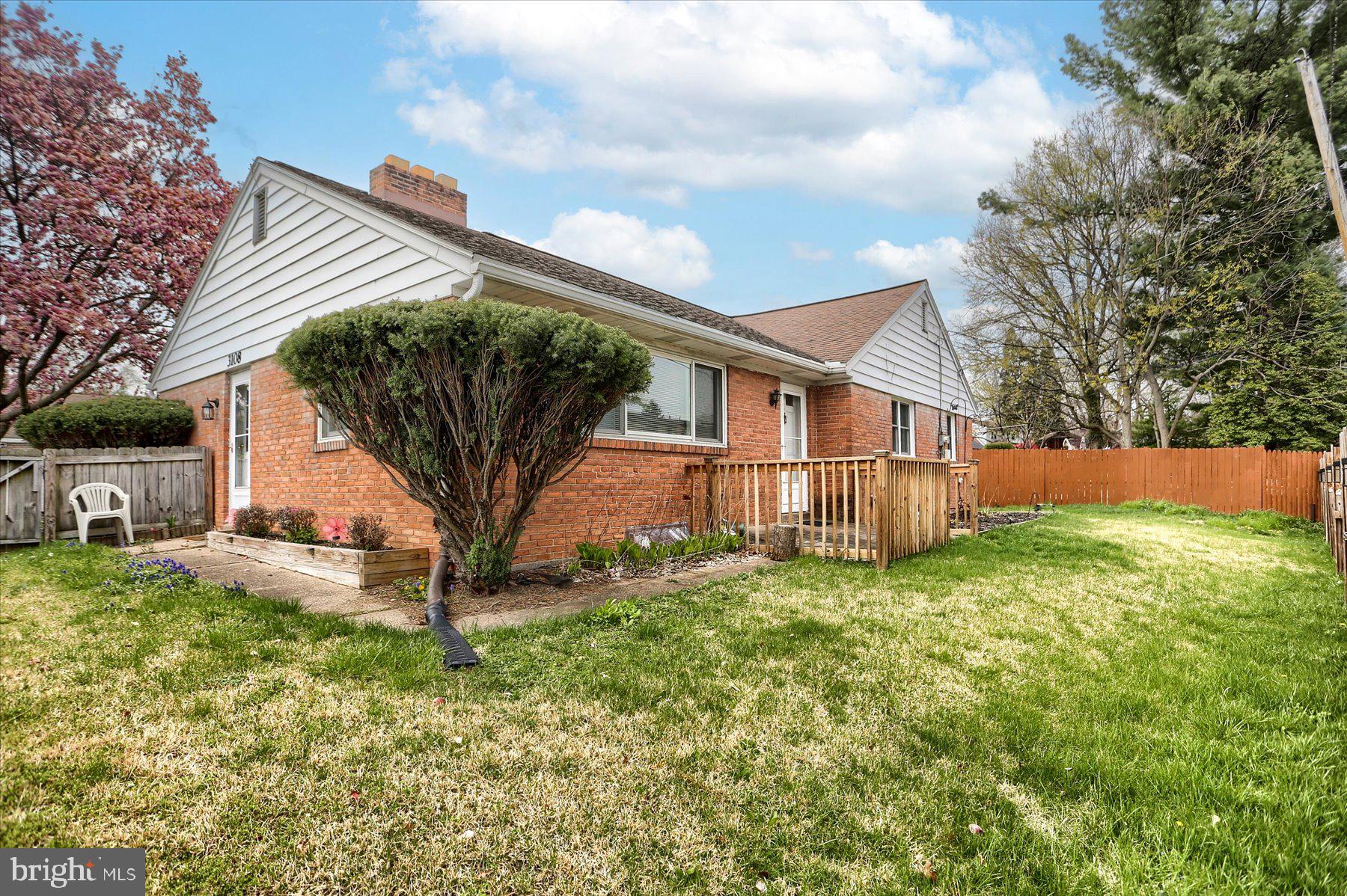 Cute 3-bedroom ranch-style home in Susquehanna Township! This single-story gem features beautiful hardwood floors throughout. Enjoy the convenience of an eat-in kitchen and relax in the cozy living room with a fireplace. The finished basement offers a spacious lounge area complete with a bar, perfect for entertaining. Plus, the fully fenced yard ensures privacy and a great outdoor space.