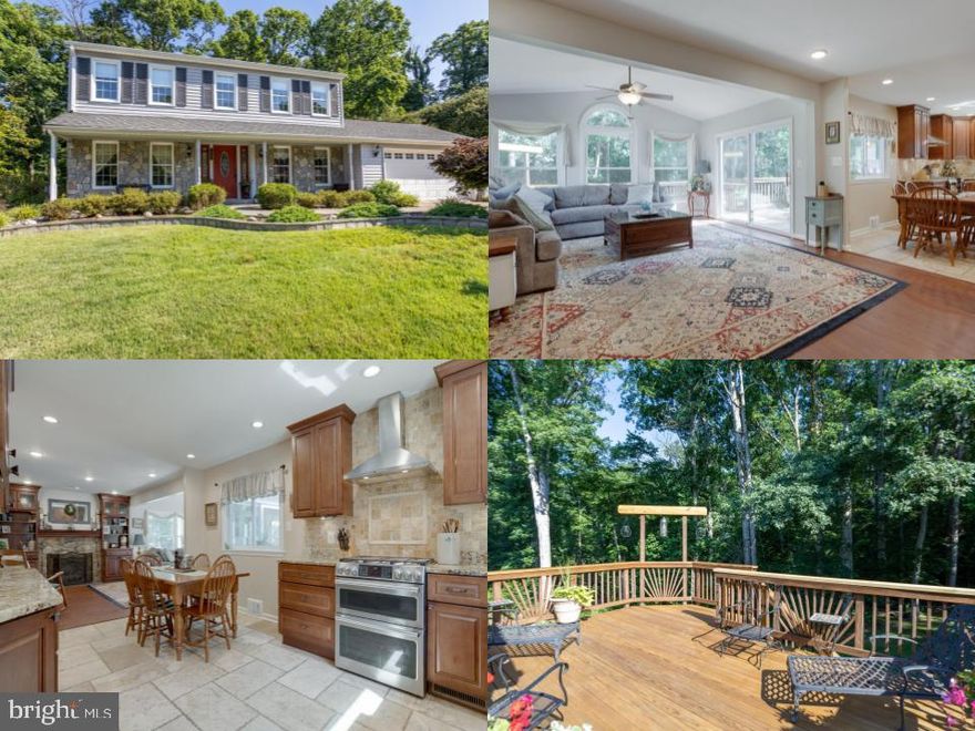 UNLIKE THE OTHERS!  With a beautifully landscaped front and backyard, fantastic addition and one of a kind features, this 5 bedroom, 3.5 bathroom Colonial delivers across the board.  The supreme curb appeal, with gorgeous paver stone walkway, only gets better. Step inside this charming home and take in the designer touches hand-crafted by loving owners. 3/4" Oak floors flow throughout the main level, and unique light fixtures have been carefully selected to accent the spaces. Formal living room can be used as private office space! The formal dining room is full of natural light, ready for your next dinner party. The kitchen has been recently renovated with granite counters, stainless steel appliances, and a large island offering additional prep space. The open floorplan rolls into the expanded family room, featuring 3 sides of windows, vaulted ceiling, and stone-faced wood burning fireplace with actual fossils in the stone slate base.  Step out to the multi-level deck to enjoy your morning coffee with a side of serene wooded views and listen to the birds.
Upstairs, the primary bedroom offers a peaceful retreat. The primary bedroom sitting area overlooks the yard space, and the reclaimed glass-paned sliding door opens to the spacious walk-in closet with hand-painted chandelier. The private bath has been updated with a walk-in shower. Three spacious secondary bedrooms and full bathroom complete the upper level.
Downstairs, the rec room is ready for entertaining! The accent wall is created with art shipping crates from the Corcoran Gallery--an incredibly unique feature! Fifth bedroom and full bath are great for guest space or one of your crew who needs their own space. Step out to the patio, perfect for summer nights. The enchanting water feature bubbles gently and has become home to several conveying green princes waiting for their kiss. The backyard spills over to trees, with a custom shed offering plenty of additional storage. Paved trail along the side of the home provides access to quiet moments or brisk runs on the Cross County Trail! Just moments to commuter parking, as well as major roads such Fairfax County Parkway, I95 and the mixing bowl. Come visit, grab a cup of Joe, and stay!