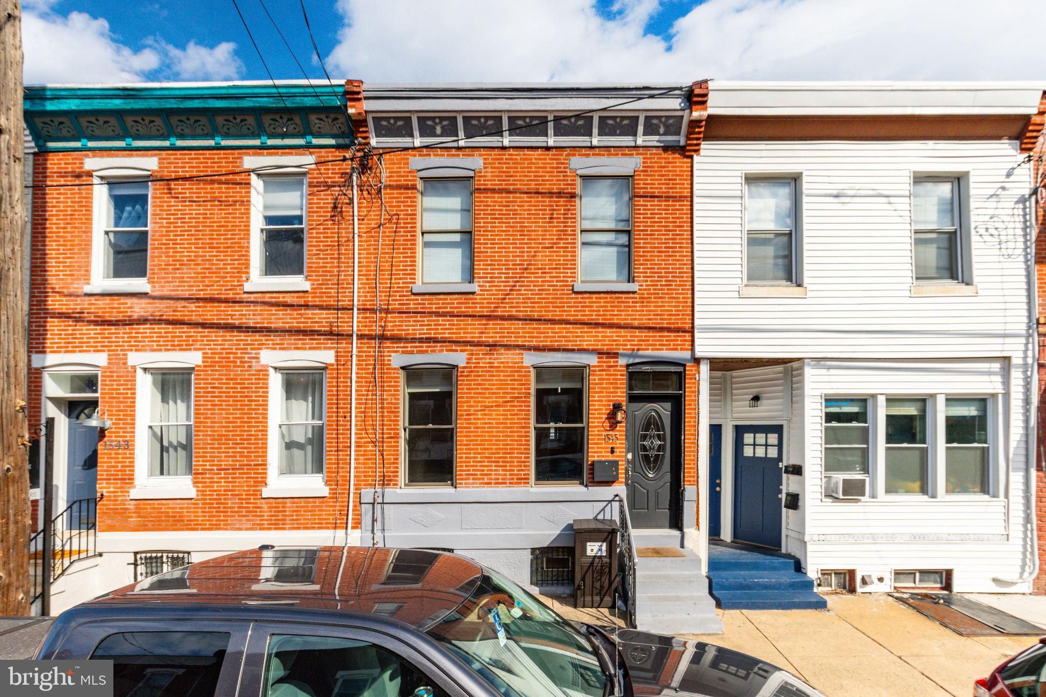 Welcome to this charming 2 story rowhome in the Point Breeze neighborhood walkable to Rittenhouse Square, Broad St, and Passyunk Ave. As you enter the cozy living room you're greeted by a beautiful exposed brick wall and ambient sunlight as well as a half bath. Past the living room, there is a dining area suitable for working or enjoying a meal. In the back of the property, you have an ample sized kitchen with gas range, fridge and subway tile. Continuing through the outside to the private backyard, there is a great, large outdoor space perfect or grilling and entertaining. Moving upstairs, you’ll find three bedrooms and a common bathroom. There are mini splits blasting the coldest air throughout the home. Lastly, there is a large, clean, dry basement for storage and conducive for home projects or a workshop. Don't miss the chance to make this your next home!