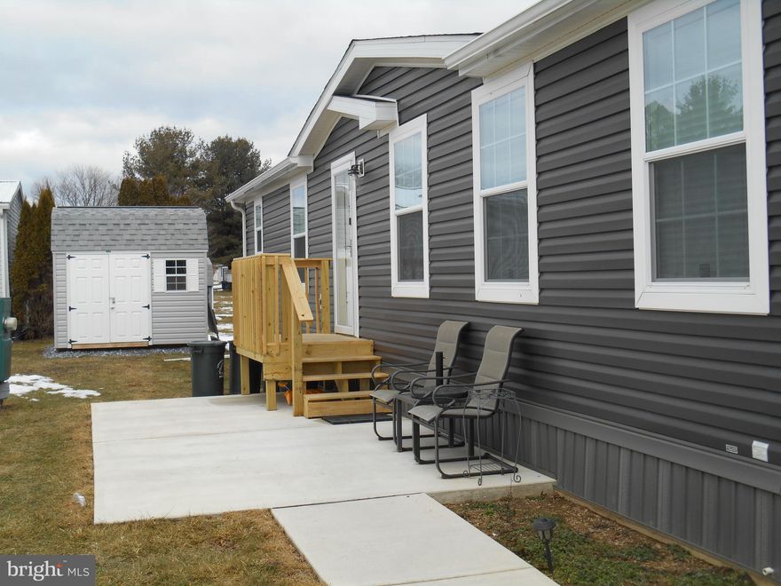 ****Sale Contingent on sellers finding suitable housing****
This Manufactured home is a definite cut above the rest. Walk into a lovely foyer with built-ins and coat closet before entering the open spacious kitchen, dining & living areas. Beautiful neutral color scheme to go with any decor.  Kitchen has a large eat at island with space for 2-4 stools with appliances like brand new.  Right off the kitchen is a  walk-in pantry to store all your extra necessities with large spacious dining area that flows  into  the open living area that makes it just perfect for entertaining.   Behind the sliding barn doors is a craft/hobby/office space literally to die for with another large central island to appease anyone that loves to be creative. It offers additional built-ins  including a desk area and more cabinetry .........you couldn't ask for more.  
You'll find the large master bedroom at one end of the home for complete privacy.  Attached is its own large walk-in closet, dressing area and full luxurious bath with a huge all tile master shower space, His & Hers sinks and plenty of storage for both. The other end offers two more bedrooms and a shared full bath with tub/shower combo which completes the living spaces. Laundry room opens into the back entry and also accessible from the craft room area.  If you want easy living in one of the most beautifully designed manufactured homes,  this is it!! 
Ground rent is 495.00 per month - covers  Common Areas and Snow removal 
**** Sale again is contingent on sellers finding suitable housing****