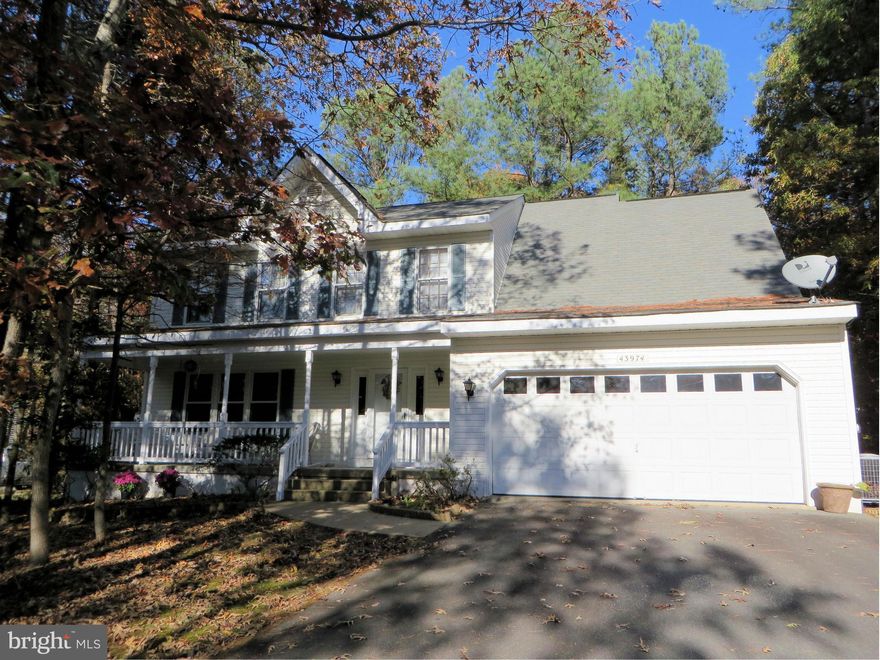 Lovely home--available  Nov 23! Attractive updated kitchen with granite counter & Duraceramic flooring, extra storage & serving bar, wine fridge. Good-sized family rm, separate living & dining rms. Master bedroom w/big walk-in closet; nice bath w/marble counter, Duraceramic floor, jetted tub. 3 more BRs, laundry room upstairs (washer/dryer supplied), ceiling fans. Front porch, patio, 2-car garage!