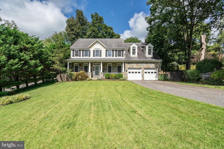 Offers due by 5 P.M. Monday, 9/18. Prominently sited on a sprawling, wooded lot in the heart of the Glen Echo Heights community, this distinctive home features 4,350+/- square feet of living, four bedrooms, three-and-one-half baths, and an attached two-car garage. 

Boasting excellent flow with generous room sizes and beautiful details, including oversized windows, crown moldings, and hardwood floors.  Approached by a flagstone walkway, surrounded by a lush front yard with boxwoods, leading to a handsome front covered porch with stonework and recessed lighting. This exemplary home enjoys a dedicated, center-hall foyer, as well as sun-drenched formal living and dining rooms. The spacious kitchen features a center island, stainless steel appliances, and a lovely breakfast room with access to the back patio with a tiered stone wall and beyond to the expansive fenced-in backyard with mature trees and shrubbery. The family room is centrally located off of the kitchen and enjoys a floor-to-ceiling stone fireplace. Additional highlights include a convenient first-floor laundry room and powder room, as well as a home office with a wrap-around built-in desk and shelving.

The second level offers the primary bedroom suite with tray ceilings and complete with a sitting room, an ensuite full bath with dual sinks and a luxurious soaking tub, and two sizable walk-in closets. There are three more bedrooms, two full baths, and an attic above for ample storage. The lower level includes a recreation room with outdoor access, a bonus room that serves as a gym or future guest suite, a large wine cellar and extra storage areas.  Multiple homeowner upgrades include generator, 

5408 Tuscarawas Road within walking distance to the natural beauty of the Potomac River, as well as the arts and culture of Glen Echo Park. Easy trail paths to Wood Acres Park and Conveniently located near downtown Bethesda, Friendship Heights, NW D.C. and major commuting routes, this property is a supreme location close to everything while providing a secluded retreat. There is also the Glen Echo Heights Neighborhood Park featuring a playground, basketball court, and a multi-use field nearby. Welcome home!


HOME FEATURES: 
4,350+/- square feet of living
Attached two-car garage
Oversized windows
Boasting excellent flow with generous room sizes
Crown moldings 
Hardwood floors 
Lush front yard with boxwoods
Flagstone walkway
Handsome front covered porch with stonework and recessed lighting
Sun-drenched formal living and dining rooms
Spacious kitchen featuring a center island
Stainless steel appliances 
Lovely breakfast room with access to the back patio 
Floor-to-ceiling stone fireplace
Expansive fenced-in backyard with mature trees and shrubbery
Convenient first-floor laundry room
Home office with a wrap-around built-in desk and shelving
Ensuite full bath with dual sinks and a luxurious soaking tub
Two sizable walk-in closets
Recreation room with outdoor access
Large wine cellar
Gym / Bonus room
Lower level offers enough space for a future guest room and full bath
Generator
Two-car garage
Oversized lot with mature plantings