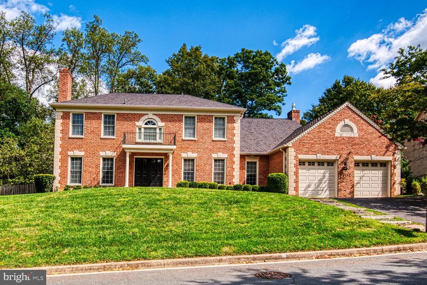 This beautiful brick colonial home sits on a half acre partially wooded lot in Woodrock in Potomac. The outdoor space is exceptional, providing areas to dine under an awning, play in the pool, or take advantage of the gentle sloping grass lawn. Built in 1985, the 5-bedroom home is a delight with custom upgrades throughout. 

A light-filled open kitchen with breakfast nook is in the rear of the home overlooking the pool. The family room has a bonus room with a double sided gas fireplace creating an airy gathering space. In the office, built-in work space for two along with bookshelves and storage space provide an ideal work from home environment. Recently refinished wood floors gleam in the living and dining rooms. 

Renovated in 2016, the show-stopping primary suite has a sitting area, a luxurious marble-tiled bathroom with soaking tub, Carrara marble tile shower and modern chrome fixtures. Two closets, one that wraps the backside of the hall stair creates drama and efficiency of space. Two bedrooms share a hall bath and the fourth bedroom has an en-suite bath. In the basement, there is a fifth bedroom with full bath, TV and movie area with bar, a wine cellar, and home gym—every box is checked, this home has it all! The two car garage has EV charger hook up and the home includes a whole house generator. The home is full of upgrades, flows nicely from room to room, and has been very well maintained making it a joy to show. 

Woodrock is located off MacArthur Blvd near the C & O Canal, Great Falls park, and just a few miles to Potomac Village.