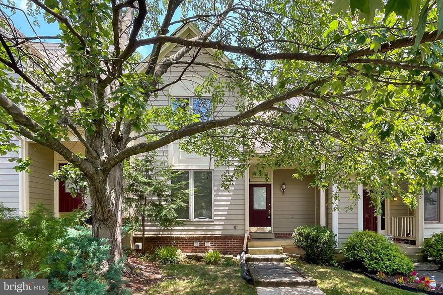 Renovated in 2018 and freshly painted throughout in 2024, this approximately 2,600 sq ft garaged townhome  w/ 1 assigned parking space in front, offers a spacious and functional floor plan with minimal stairs for easy living! Step into a welcoming two-story foyer with hardwood flooring throughout the main level and staircase. The open-concept kitchen features granite countertops, ample cabinetry, and newer stainless steel appliances—perfect for both cooking and entertaining.  Upstairs, the primary bathroom includes updated LVP flooring, while the secondary bedrooms share access to an adjoining balcony.  The lower level offers a generous recreation room with LVP flooring, a separate office/den, and a full bath—great for guests or work-from-home flexibility.  Enjoy the serene outdoor space with an oversized deck that backs to trees and away from Ffx Pkwy, offering privacy and a peaceful retreat. Conveniently located within 12 minutes from the Vienna Metro, near major commuter routes, shopping, and much more!