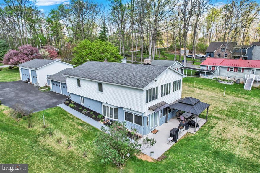 Discover lakeside living at its best at 478 Lake Meade Drive, nestled in a desirable gated community. From the moment you arrive, this thoughtfully updated waterfront home invites you to slow down, unwind, and enjoy the views.  The main level offers a warm and welcoming layout designed for everyday comfort and entertaining. A spacious, upgraded kitchen flows into flexible dining options, including a bright sunroom just off the kitchen. The living room features a propane fireplace for cozy evenings, while the adjoining sunroom creates the perfect place to relax with morning coffee or host guests.  Upstairs, the primary suite provides a peaceful retreat with a private bath, while two additional bedrooms and a second full bath offer space for family or guests. A sunroom with beautiful Lake Meade views adds incredible versatility—ideal for a home office, gym, or extra sleeping space.  Since 2016, the owners have invested in extensive improvements to enhance comfort, efficiency, and modern living. These upgrades include improved insulation, propane heating, remodeled spaces, upgraded Wi Fi throughout the home (including the boat dock), and thoughtful touches for those who work remotely.  The fully renovated lower level expands the living space even further, featuring updated flooring, a refreshed fireplace, French doors at the main entry, mini split HVAC systems, LED lighting, a stunning kitchen with quartz countertops, a coffee bar, and seamless connectivity throughout.  Step outside and enjoy the true highlight of this home—a short, level walk to your private dock and sun deck, complete with upgraded beams and posts. Whether you're boating, entertaining, or simply enjoying the peace of the water, this setting is hard to beat.  This is more than a home, it’s a lifestyle.  Schedule your private tour and see why life at Lake Meade feels just right.