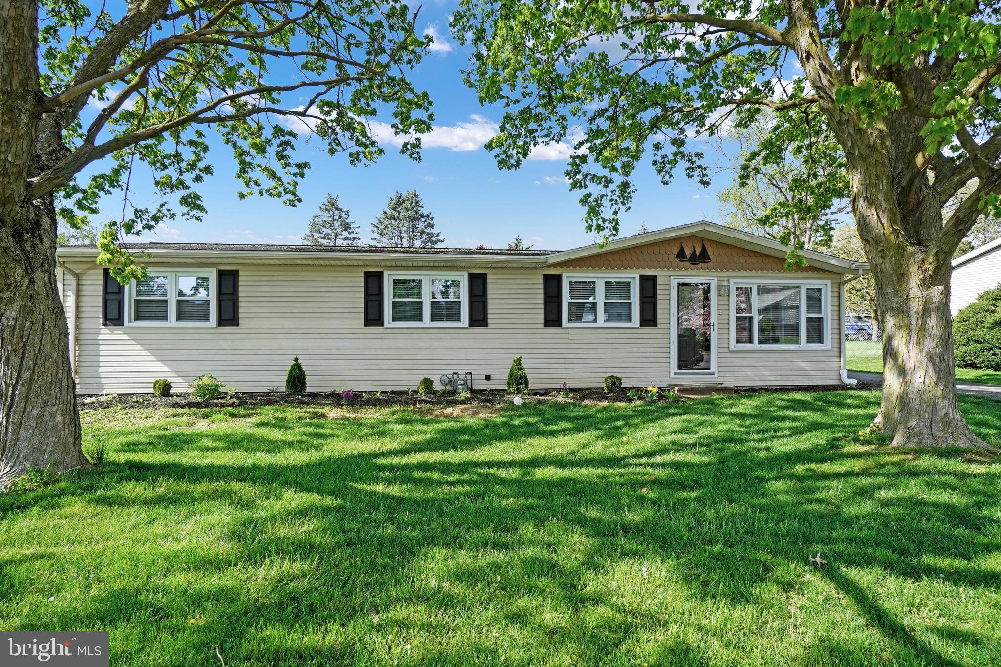 Live the easy life in this stunningly remodeled rancher in sought-after Mount Joy! This gorgeous home boasts lots of upgrades that guarantee comfortable, modern living. Cathedral ceilings grace the living room, creating a sense of airiness and openness. Unwind or entertain on the delightful enclosed rear porch, perfect for creating a cozy reading nook or entertaining. The finished basement offers additional flexible living space, ideal for a family room, home theater, or even a private gym. The heart of the home, the kitchen, boasts brand new cabinets for all your storage needs, gleaming granite countertops and a stylish ceramic tile backsplash that adds a touch of elegance. Move right in and enjoy the peace of mind of a brand new roof, fresh paint throughout, new luxury vinyl plank flooring for easy maintenance, and plush new carpets for comfort underfoot. Ample storage throughout keeps everything organized, and a one-year home warranty provides added security.