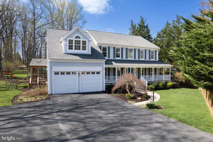 **The seller has set an offer deadline of 8:00 PM on Saturday, April 12th with an expected decision some time early Sunday.** Immaculate colonial located on a park-like lot in Turf Valley Overlook just steps to the walking trails in David Force Park!  An inviting front porch and a sunny, two story foyer welcome you to this special home that has been well cared for by the original owners.  The kitchen features on-trend white cabinetry, quartz countertops, upgraded stainless steel appliances, a lighted pantry and plenty of room for a gathering table.  The adjoining family room has an impressive vaulted ceiling and a cozy wood burning fireplace.  The spacious living room and formal dining room feature rich hardwood flooring, crown molding and are the perfect place for entertaining.  The main level office with hardwood flooring features a bay window and French door access to the deck.  A convenient, main level laundry room offers additional cabinetry, folding station and has easy access to the two car garage with EV charging. Hardwood steps lead to an open and airy second level.  The primary suite features vaulted ceilings, two walk-in closets, a built-in window bench with cedar lined storage and a separate sitting room, ideal for a nursery, home office or 5th bedroom.  The remodeled primary bathroom offers heated floors, separate sinks/vanities with quartz countertops, a jetted tub and a walk-in shower with frameless glass door and multiple shower heads.  Three additional bedrooms share an upgraded hall bath with double sink/vanity with quartz countertops.  The walk-out lower level features a great area for binging your favorite shows, a rec room for games & exercise, a den/possible 6th bedroom, a full bathroom and a workshop.  Relax on the screened porch or large deck overlooking one of the best lots in Turf Valley.  Don't miss the swingset and the adorable playhouse, both are included!  Top ranked schools including Marriotts Ridge High School and convenient to all the amenities in Turf Valley including shopping, dining and recreation.
