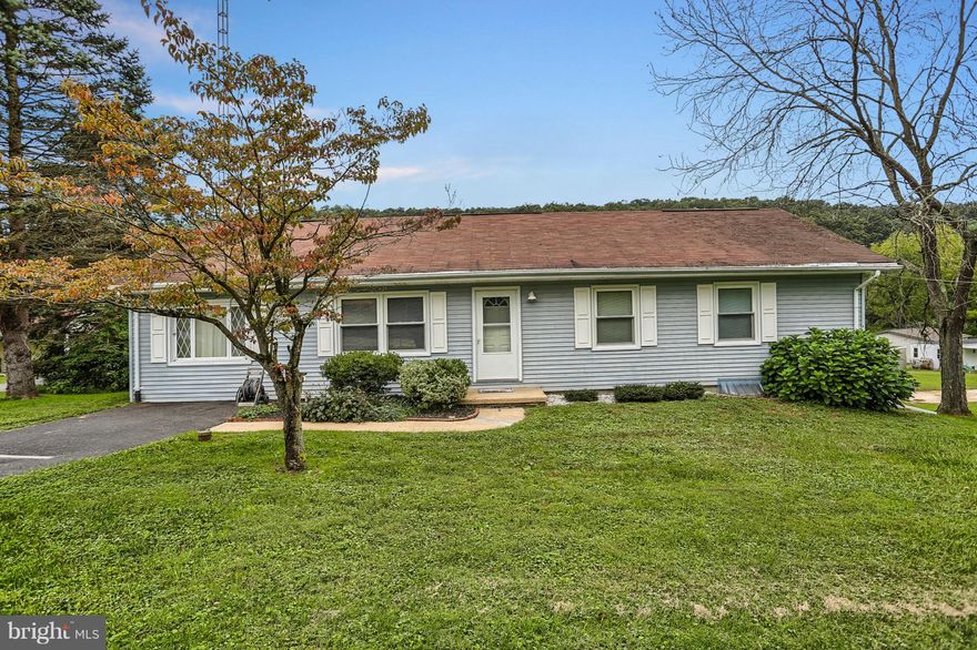 If you are looking for one floor country living  with acreage that backs to stream and woods, then this is the home for you. This Cozy 3 or 4 BR stick built rancher features a nicely updated kitchen , spacious living room & family room, lower level walk out basement for future expansion, lots of parking, additional concrete pad with electric service great for RV parking or to build a garage,  large rear patio and all appliances included.  Convenient rural location, 10 minutes to schools and shopping.  Don't let this one pass you by.