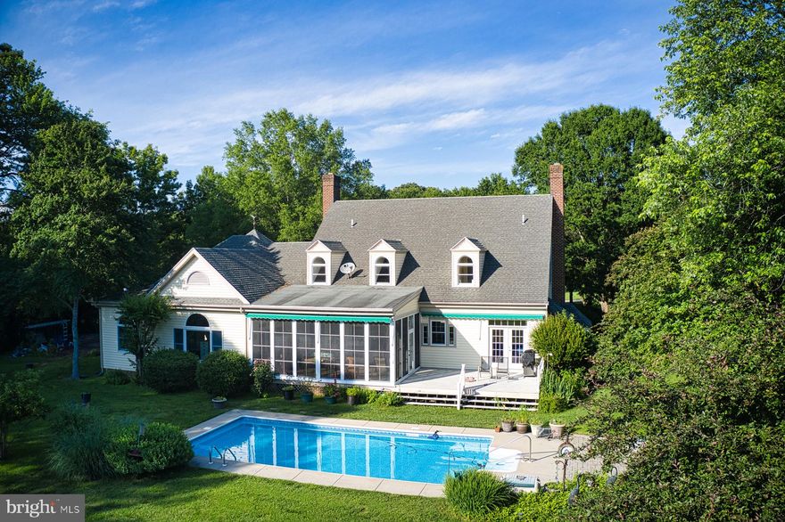 PRIVATE SETTING OFF BELLEVUE RD LOCATED TUCKED AWAY AT THE END OF A SHARED DRIVEWAY YOU ARRIVE AT  THIS SOUTHERN LIVING  BUILT HOME  SURROUNDE BY GORGEOUS TREES AND FARMLAND.
FOUR BEDROOMS, LIVING ROOM, DINING ROOM, A FAMILY ROOM OFF THE KITCHEN AND A SCREENED PORCH. THE PRIMARY BEDROOM IS LOCATED ON THE MAIN FLOOR AND CAN ACCESS THE SCREENED PORCH. GENEROUS STORAGE AREAS AND A WALK IN  ATTIC ROOM.
THERE IS A WATERSIDE VINYL POOL AND A DOCK WITH CA 3 MLW. 
THE PROPERTY IS SUBJECT TO A RIGHT OF WAY  EASEMENT.