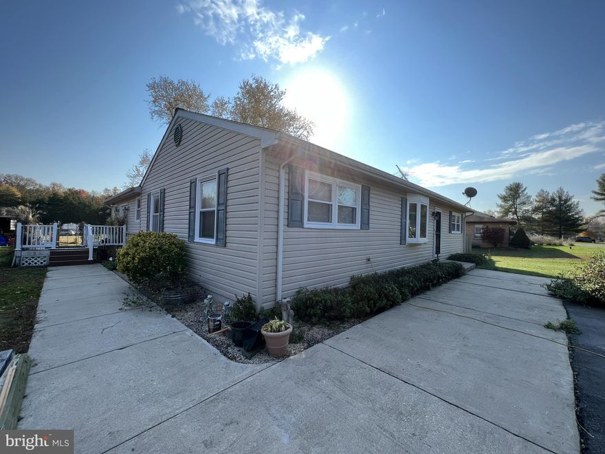 Escape to the tranquility of country living with this  3-bedroom, 2-bath ranch home nestled on 1.29 acres. Located in the coveted Bohemia Manor High and Middle school district with Holly Hall Elementary in proximity, this property offers a perfect blend of comfort and convenience. No homeowners association provides the freedom to personalize and enjoy your space to the fullest.  Efficient Living: Geo thermal heat/AC and an on-demand water heater ensure energy efficiency and instant hot water.  Masterful Master Bedroom: The spacious master bedroom boasts a recessed ceiling, providing a touch of luxury to your retreat.  Relax in the family room featuring a gas stove for added warmth during cooler months.  A convenient door opens to a large yard, creating a seamless indoor-outdoor living experience.  Property complete with a sizable yard and three sheds offering ample storage space for tools and equipment.  This home leaves you the opportunity to make this home yours with your own ideas!!!!  SOLD AS-IS.  Drainfield failed and  unknown whether  it will perc or not.  Currently functions