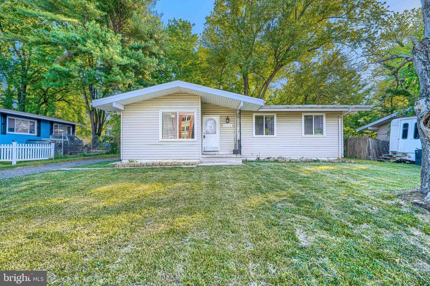 Discover the charm of this well-maintained raised ranch in the desirable Burmont neighborhood. Built in 1959, this home seamlessly blends classic design with modern comforts, offering a spacious 1,656 sq. ft. of finished living space. Step inside to find an inviting open floor plan adorned with hardwood and stylish laminate plank flooring. The heart of the home is the country-style kitchen, featuring a generous island and stainless-steel appliances, perfect for culinary enthusiasts. The dining area flows effortlessly into the living space, creating a warm and welcoming atmosphere. This residence features three convenient entry-level bedrooms, ideal for guests or multi-generational living. The two full bathrooms are thoughtfully designed, with relaxing tub shower combination. Venture downstairs to the fully finished basement, and you will find a spacious family room and an extra room offering versatile space that can be converted into a recreation room, an office or extra storage room. With both interior access and a walkout entrance, this space is as functional. Outside, enjoy the tranquility of your 0.21-acre lot, complete with a spacious deck perfect for summer barbecues or morning coffee. The property is enhanced by sidewalks and streetlights, ensuring a safe and pleasant environment. With off-street parking and a prime location, this home is a rare find that combines comfort, style, and convenience. Don't miss the opportunity to make it yours!