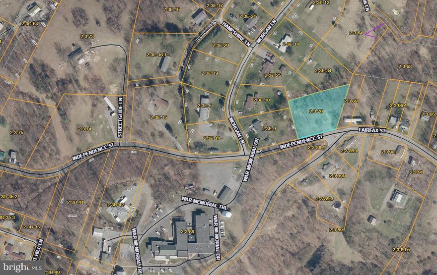 Wooded, sloping lot located just outside of downtown Berkeley Springs, WV (Town of Bath).  Property is conveniently situated at the corner of Independence Street and Fairfax Street near the new 522 Bypass.  Property is .966 acres (a small portion was taken for the 522 Bypass) wooded and gently sloping with access to public water and public sewer.