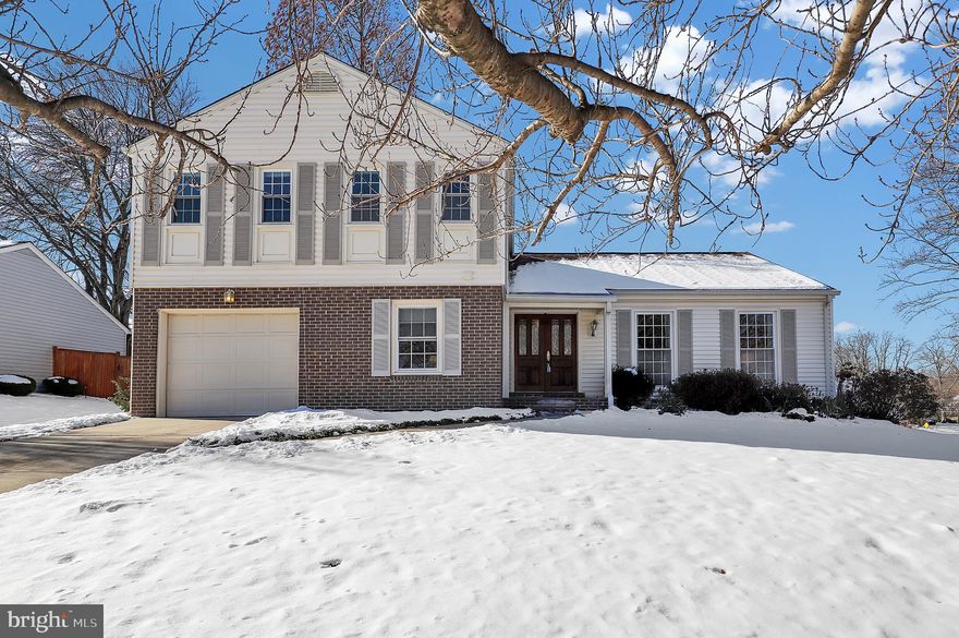 Welcome to 5228 Trailway Drive!   Our beautifully renovated 4-level home in the desirable Manor Lake community features fresh paint, gleaming hardwood floors on all three levels and new windows. The upper level includes a spacious master suite with a walk in closet and renovated bathroom.
3 additional sunlit bedrooms with large closets, hardwood floors and renovated hall bath. The main level boasts a gracious foyer, updated kitchen with island and eat-in space, plus a sunlit formal living and dining room. The lower level offers a grand family room with a wood burning fireplace and door leading to the paved patio and flat fenced backyard.  An office, powder room, and access to a 1-car garage.  The unfinished basement offers ample storage or the potential for customization.   See photos of the gorgeous gardens, plants are annuals and will bloom this spring.   Conveniently located near Metro stations, ICC, Rock Creek Park, and shopping/dining.  One block to Lake Frank and trails to Rock Creek and Needwood.  Manor Lake is a friendly community with neighborhood watch, many events such as annual Turkey Trot and Block Parties to name a few.  Come be our neighbor!