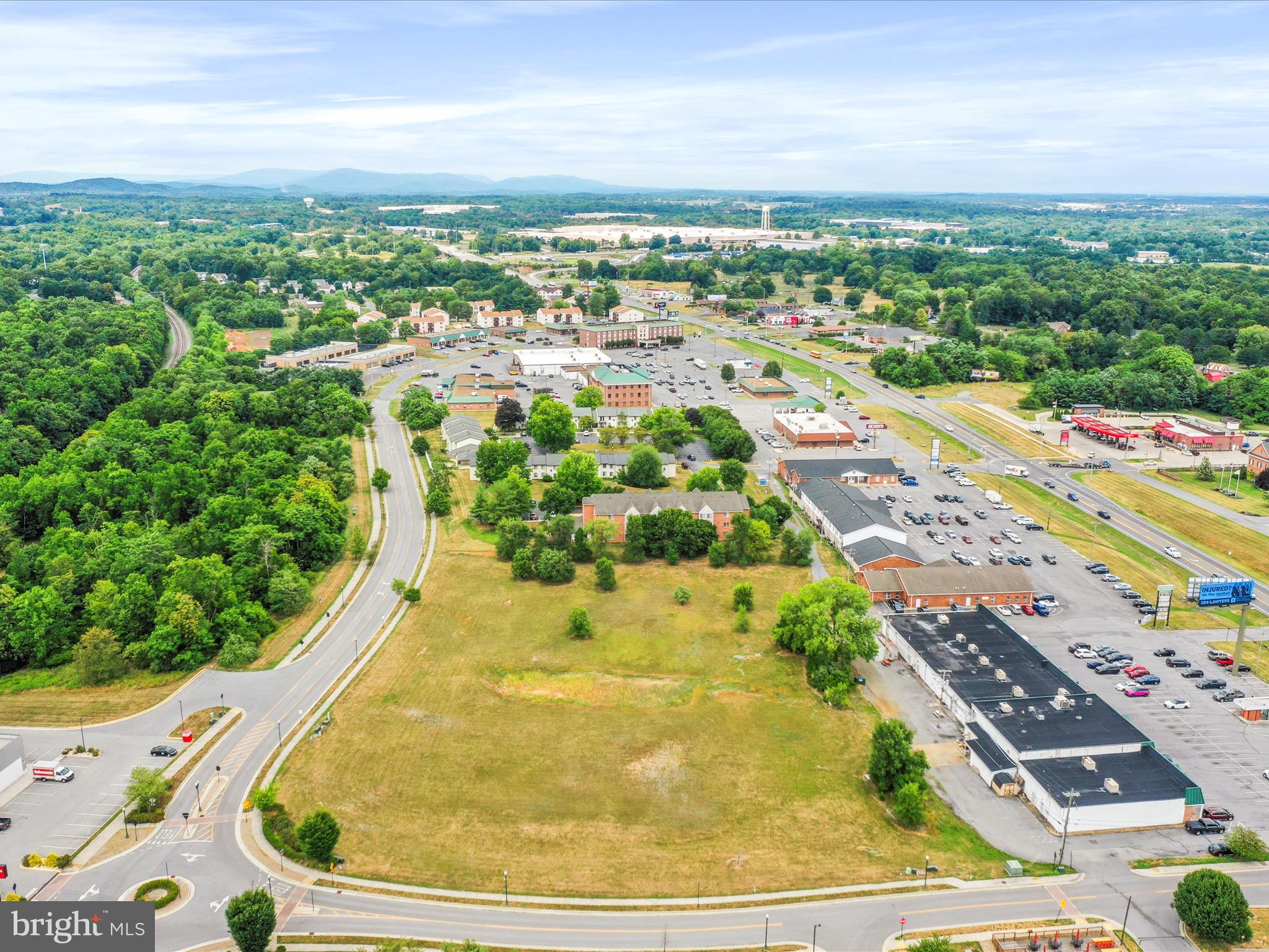 Incredible opportunity to purchase land in the Growing Courthouse Square Section of Martinsburg. New townhome subdivision has just been approved for 173 units one block from this lot. This is considered the Business District of Martinsburg and the city is behind responsible growth in this area. Zoned for Mixed Use Commercial, there are multiple uses that can be permitted including, but not limited to retail, professional office, storage, flex space, sales, banking, and more. Both roads are paved and sidewalks surround the area. There exists the possibility for two entrances to the site from Lutz or Meridian. Some Owner Financing may be available for a first trust position depending upon plans and building use. See Covenants and Restrictions in Documents