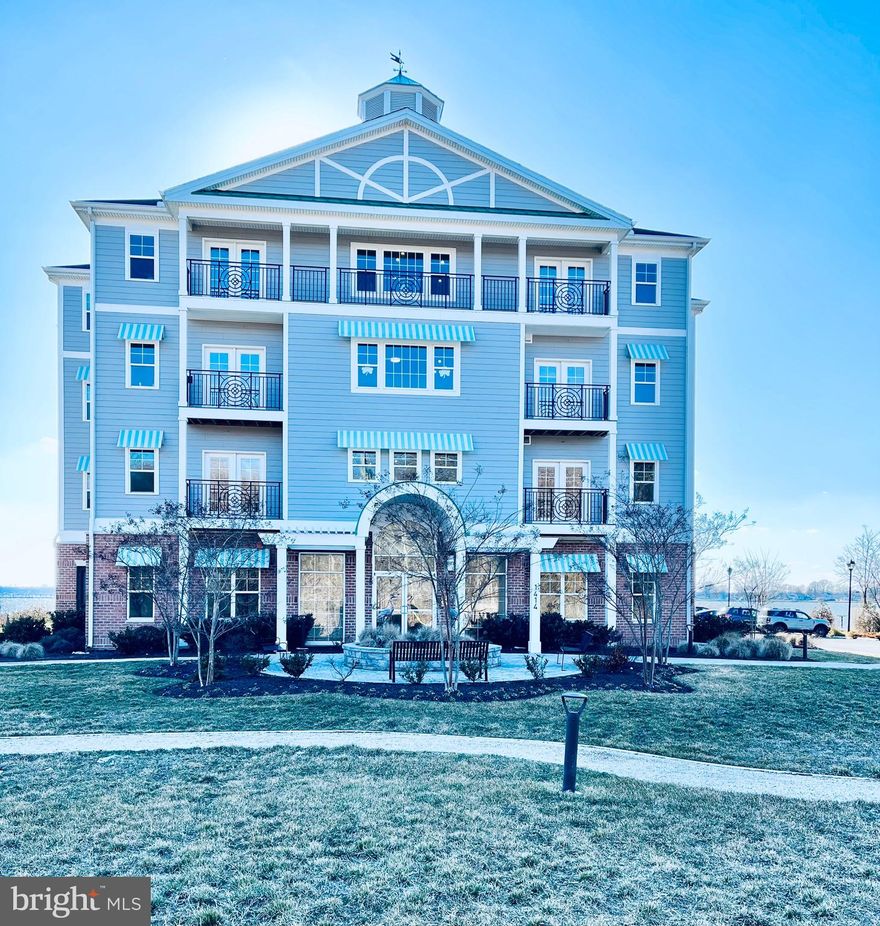 WOW is the only way to describe these nearly new condo units.  Only three years old and this unit has been barely lived in. Many builder upgrades make this large two bedroom and two full bath condo with water views from all windows a delight to live in. The comfortable deck has a great view of the water and overlooks the community's  private beach area. This unit includes a dock on the community pier and it has a 12,500lb lift. You will also get a dedicated parking spot and an extra storage closet located in the covered and secure parking garage.  Additional parking is located on the property but is not assigned. Back inside this beautiful condo you have vaulted ceilings as this unit is on the top floor, giving you a bright and open feeling as soon as you walk in! The well equiped kitchen has granite counters and stainless steel appliances along with a wonderful breakfast area with water views. The living area is open and has a nice dining area for more formal meals. There is a seperate laundry room with extra cabinets for additional storage. The primary bedroom has an additional seating area , a walk-in closet and a bath that includes a large shower area with a bench. The second bedroom is a great size and has a walk-in closet. 
These condos are very rare for the Middle River area and even more rare that they come on the market!
If you are looking for maintenance free living in a water oriented community, with water views in a barely used condo, I would not wait any longer! You will not be dissapointed!