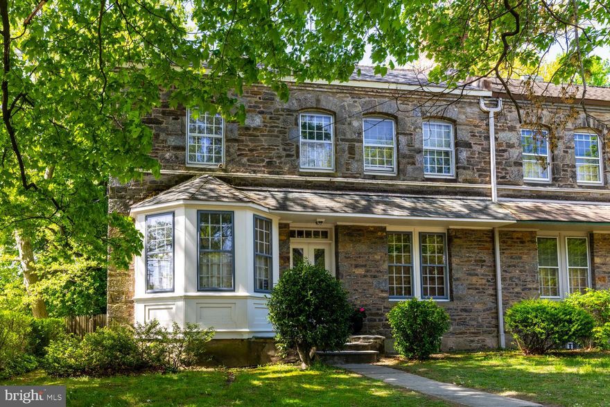 Welcome, to this spacious home with 4 bedrooms, 2 full baths and with great natural light located on the corner of West Rittenhouse St and Wayne Ave.  Centrally located in West Germantown, close to shopping and public transportation this property has a backyard that is fenced-in, offering a more private setting for the yard and patio. Built of Wissahickon Schist with three fireplaces, one wood, one electric and one decorative. Natural daylight via the large windows , rooms with high ceilings, original woodwork and hardwood floors throughout.  Easily accessed walk-up with skylight to the attic space.  The basement has a Bilco entrance for additional storage and workspace. This house was owned for many years by a artist who used one bedroom and the basement for studio space.  There are two separate entrances to the backyard/patio with access to the garage-driveway area. Kitchen and baths need updating, but location, spaciousness within, and off street garage parking make this a diamond in the rough.
At the back of the property are four connected garages,  the first one closest to the street is the one that is deeded to 5900 Wayne along with a deeded easement that allows for the other garage owners to access their garages  using  the gravel driveway that crosses the back part of the rear yard.  The driveway access is off of West Rittenhouse St near the corner. This house is within walking or a short car ride or public transportation to Mastery Charter School, The Waldorf School, Lingelbach Elementary, Philadelphia School for the Deaf, Penn Charter, Green St Friends and A. Wayne High School.  Nearby are Planet Fitness and Weavers Way Coop. Ultimo Coffee Shop is right across the street.