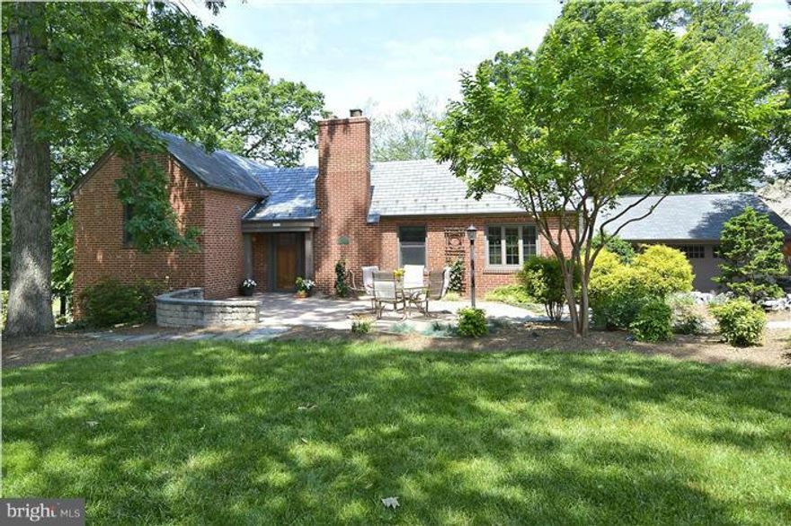 Charming brick & slate roof home w/ arts & crafts flair. Sits on .33 acre w/ beautifully manicured yard & custom hardscape w/ large brick patio for outdoor entertaining. Updated kitchen to covered veranda off back. Custom built ins, hardwoods, FP w/ custom mantle, finished walk out basement, deck & detached 2 car garage (studio space). Near metro, I-495, Fillmore music, AFI, Discovery Ch. & DTSS.