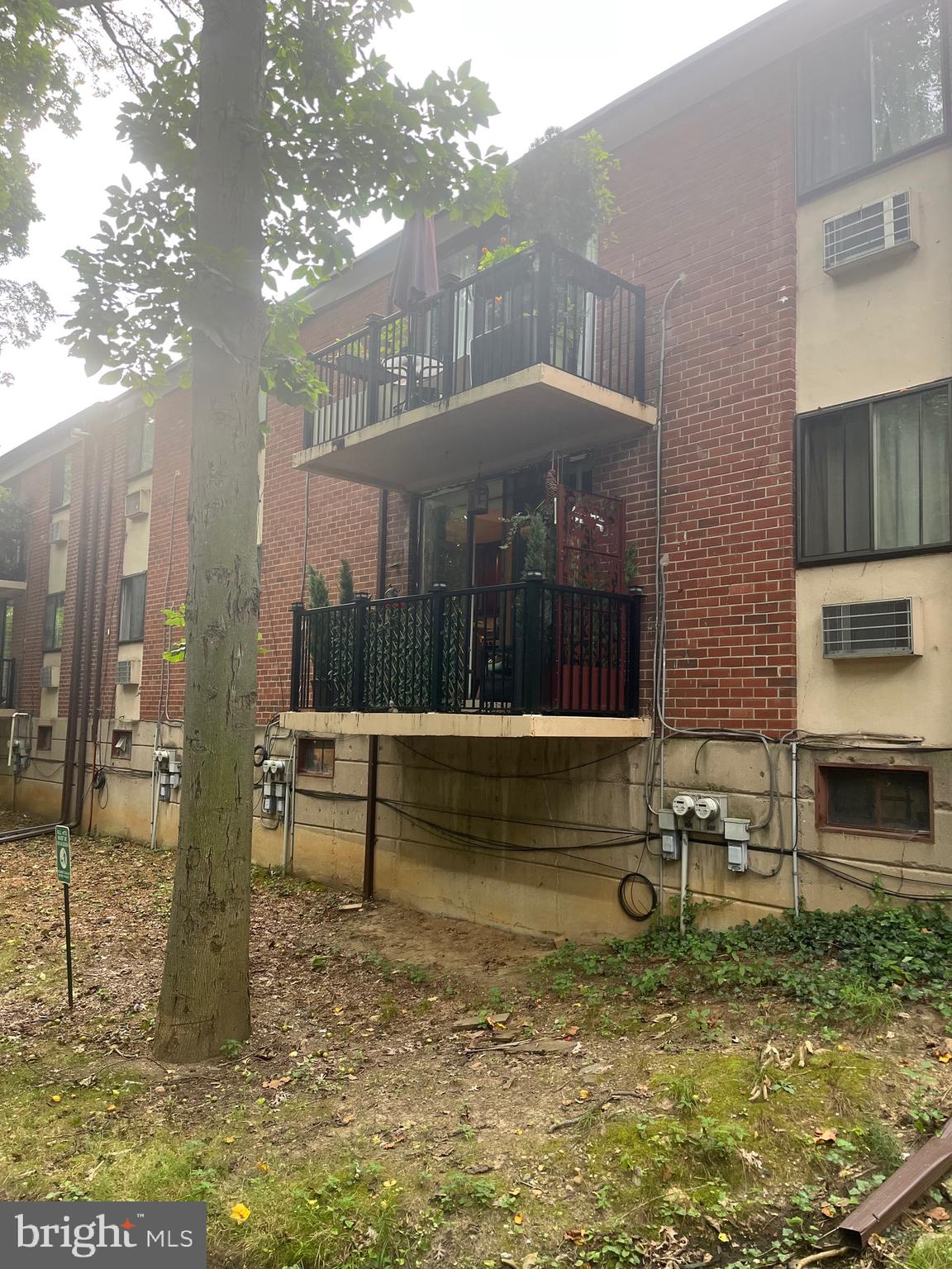 Location! Location ! Location! This incredible one bedroom, first floor unit is located in the most desirable building in the Contemporary Village. Although this a first floor unit this condo has a wonderful balcony in the secluded rear of the E Building overlooking the wooded creek and assuring privacy in your little corner of the world. The bedroom also enjoys the wonderful panoramic views of the wooded back yard and flow ing creek. The air conditioning is newer as is the kitchen. The bedroom boasts a large walk in closet with a closet system to allow you to organize your belongings. The hall closet also is fitted with a closet system. Sit in your spacious living room and still enjoy the view out through the sliding glass doors. This unit comes with a large locked storage unit in the basement as well as a common laundry area. The Contemporary Village Condominium Association has offices on site for your convenience and the monthly condo fee includes the water and heat as well as the exterior maintenance. There are also two in ground pools available for residents . Come and take a look at this unique unit in The Contemporary Village and you will agree that this is one of the most desirable locations in the Village.