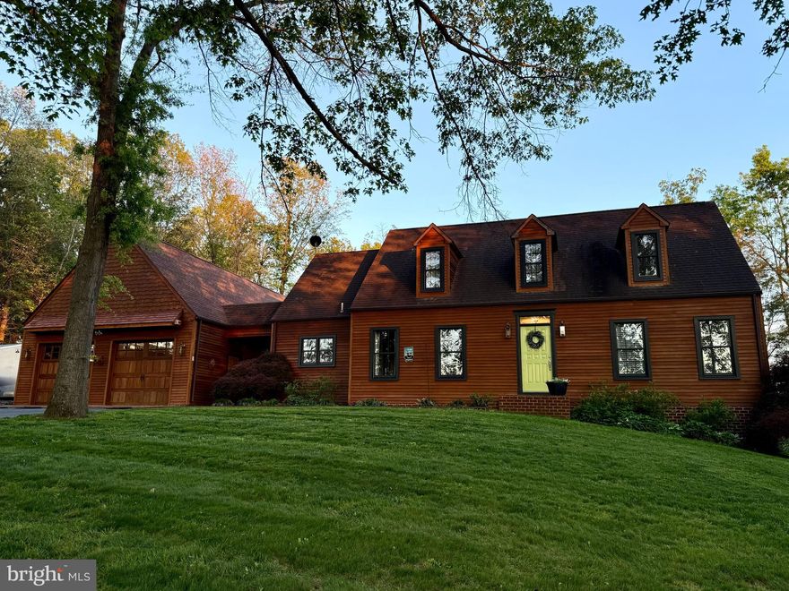 *Professional pictures coming!  WELCOME HOME!  Gorgeous one owner custom home on 3.3 beautiful acres.  Approximately 2600 finished square feet (above ground).   Upgraded eat in kitchen with backsplash, marble and butcher block countertops, SS appliances, cherry cabinets open to large family room with pellet stove.  Separate dining room.  Foyer, half bath. First floor primary suite includes walk in closet and private full bath, marble top double vanity, oversized walk in shower.  Upstairs there are 3 additional bedrooms, a full bath and a great entertainment / sitting area with multiple potential uses.  The unfinished walk out basement has an improved area that could be a future legal 5th bedroom.  Basement laundry and wood stove.  Rear covered cove for relaxing. Rear patio looks over large fully fenced yard.  Large heated and cooled garage for 3 or 4 cars, or hobby / workshop space.  MASSIVE 14x46 area over the garage for storage or possible future living space!  Surrounding farm is in land preservation which means no building! 

*tax record is incorrect!  Home approximately 2600 above ground square feet PLUS unfinished basement, 2.5 baths.