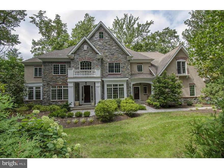 Better then New Construction, Outstanding Value, Pristine Move In Condition! This Spectacular Stone Estate Manor Home is Impeccably hand crafted and features exquisite architectural details. The Grand floor plan offers a dramatic two story foyer enhanced by a custom curved staircase, a Formal Living Rm. and Elegant Dining Rm. with generous Amish Millwork, Built-Ins, granite surround gas fireplace, 10 ft.+ ceilings, site finished wood floors and custom paint throughout, set the stage for your entertaining needs. Enjoy Family gatherings in the centralized Family Rm. w/wood burning fireplace and wall of windows providing views of the bucolic park like setting. An Epicurean Kitchen w/furniture quality Plain & Fancy cabinetry, Viking cook top, high end stainless steel appliances, built in computer center, walk in pantry and Butlers Pantry is adjacent to a unique two story Morning Rm. w/ access to outdoor deck and exceptional back yard full of natural wonders and private vista views. Main floor Library/Office, Bright Sunroom, convenient Mudroom and formal powder rm. completes the main floor. Upstairs you will find an Affluent Master Bedroom Suite consisting of a sitting rm., dressing area w/vanity, gas fireplace, walk in closet and relaxing Spa bath. Four additional Bedroom suites each w/unique designer bathrooms completes this level. There is an abundance of room in the walkout finished lower level, with its flexible floor plan comprised of a media /game room w/sandstone bar, exercise rm., full bath and more, perfect for In-Law or Au Pair. Unparalleled to any other home in the area?All this in a Prime Wayne Location!