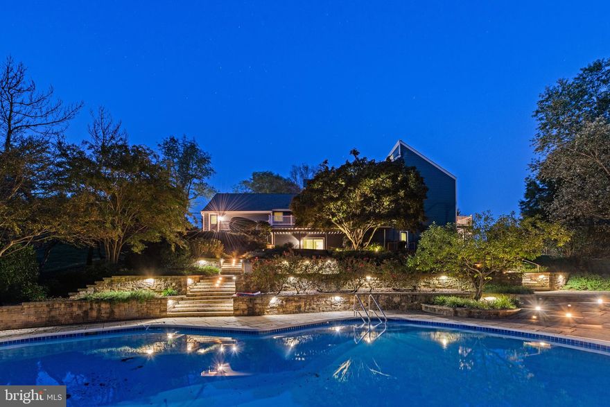 A picturesque sanctuary awaits, at the end of a quiet cul-de-sac within the prestigious Overlook gated community. Spanning over 5,000 square feet of living space, this 6-bedroom, 4.5-bathroom home has been refreshingly modernized to offer everything you could ever want or need. Inside, the main level boasts a freshly redesigned kitchen that features custom cabinetry and countertops, paired alongside all new Viking appliances. The multiple living & sitting rooms, dining room, and den all contain refinished hardwoods and Vaulted ceilings to allow a flooding of natural light throughout. 3 gorgeously inviting fireplaces, along with a highly prized main floor primary suite, complete w/ expansive en-suite bathroom, round out the main living level of this home. Upstairs 3 perfectly situated bedrooms and 2 additional full bathrooms can be found. Downstairs to the lower level, an expansive area with new wet bar and pool table make for a great entertaining spot and comfortable guest living space with 2 additional bedrooms and full bathroom alongside multiple walk-outs. Outside to the nearly 4 acres of land, you can enjoy an outdoor lifestyle with 5 decks, 3 patios, and a stunning pool surrounded by some of the most breathtaking gardens and sunsets you'll ever see. With mature trees, a tranquil stream, and a spring-fed pond, this property is truly one of a kind inside and out.