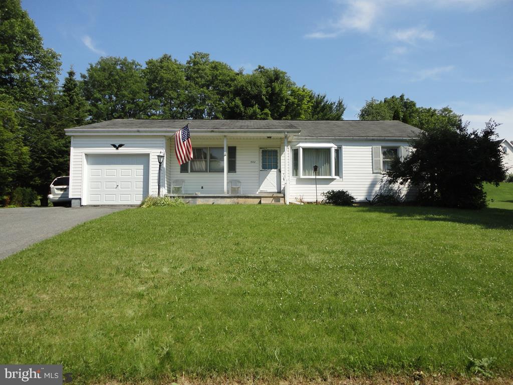 Great Ranch Home with lots of potential located on a quiet street conveniently located only minutes to town and campus with easy access to I99. This is a wonderful chance to add your special special touch and make this wonderful home your own. Special features include; covered rear patio overlooking large private rear yard, large eat-in kitchen, hardwood floors, fireplace and 1 car garage. Unfinished basement has heat and can be easily finished for additional living space. Shelving in utility room and shed offer plenty of storage. Tons of potential at a great price. Don't miss out. Schedule your private showing today.