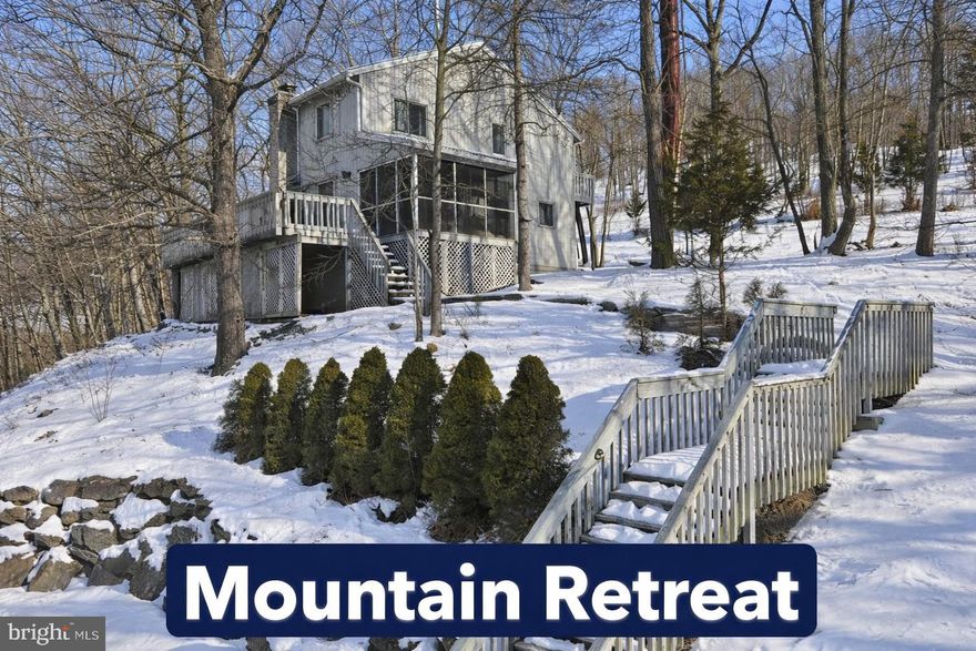 Welcome to your dream retreat in the heart of Lehman Township! This stunning three-bedroom, two-bathroom home offers the perfect blend of comfort and natural beauty that will make every day feel like a vacation. Step inside to discover a spacious open floor plan anchored by a charming brick-front wood burning fireplace—perfect for cozy evenings. The brand-new luxury vinyl plank flooring flows seamlessly throughout, combining durability with sophisticated style. The well-appointed kitchen features a convenient breakfast bar for casual dining. Main floor living is a breeze with a first-floor bedroom and full bathroom—ideal for guests or multi-generational living. Upstairs, the primary bedroom boasts en suite bath access complete with a jetted tub and stall shower. A generous loft and additional large bedroom provide ample space for everyone. Outside, spectacular views await from your expansive deck and screened patio—your personal sanctuary for enjoying every season. This amenity-rich community delivers year-round recreation including lakes, pools, skiing, indoor tennis, a fitness center, and a fantastic restaurant with breathtaking vistas. Schedule your showing today!